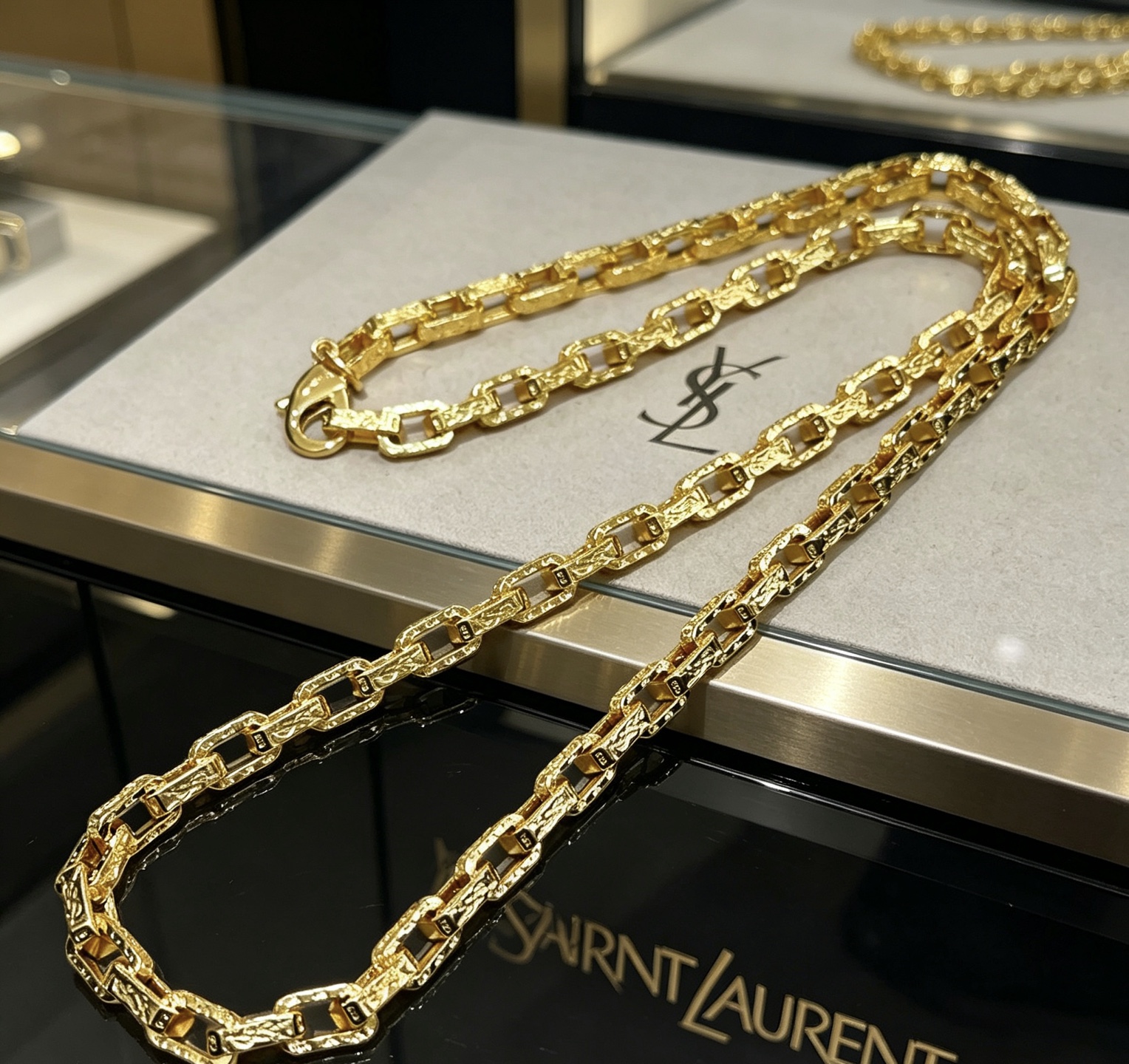 Saint Laurent Textured Chain Link necklace gold-tone metal with black enamel accents 60cm