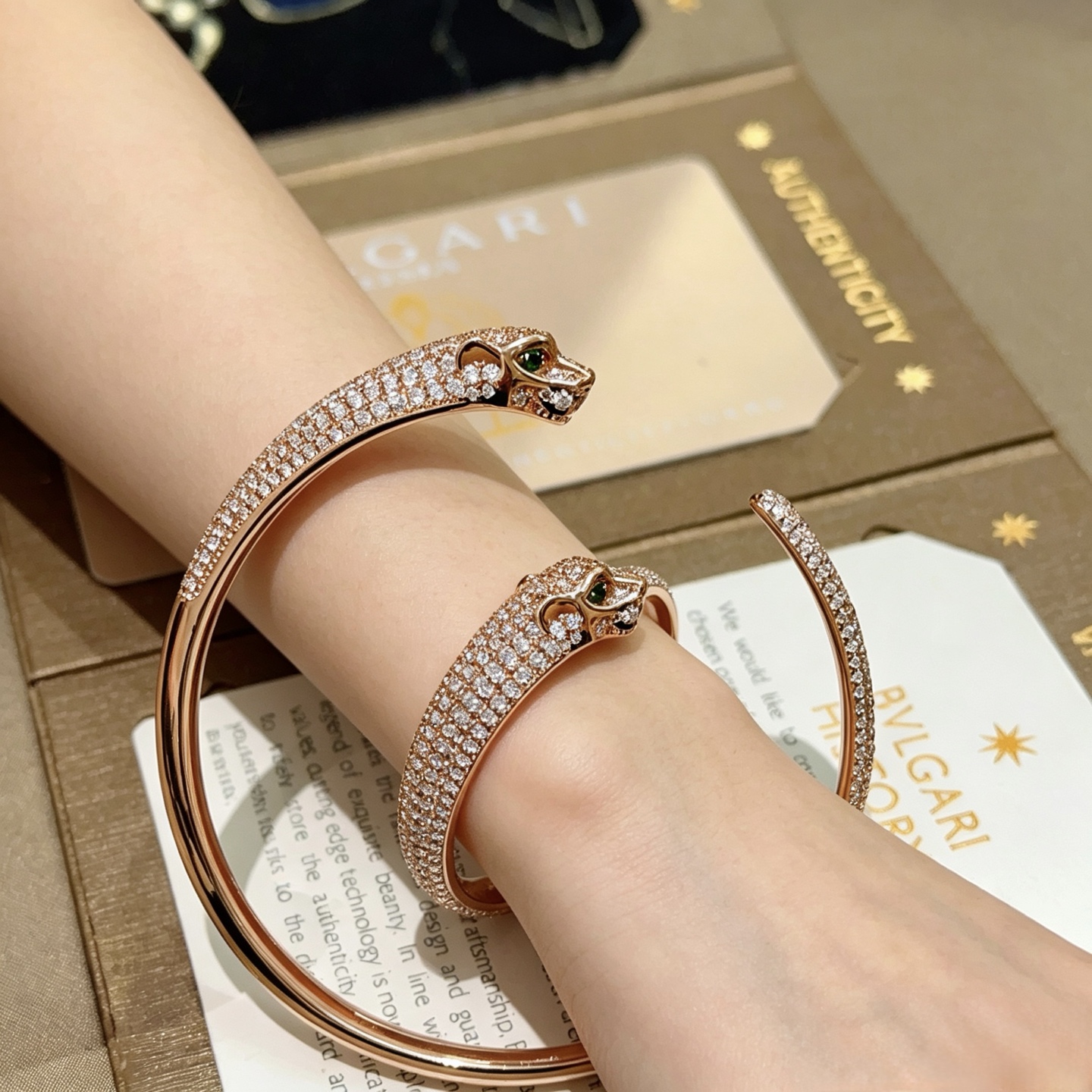Cartier Panthere de Cartier bracelet 18K rose gold pave set white diamonds green tsavorite garnet eyes 17