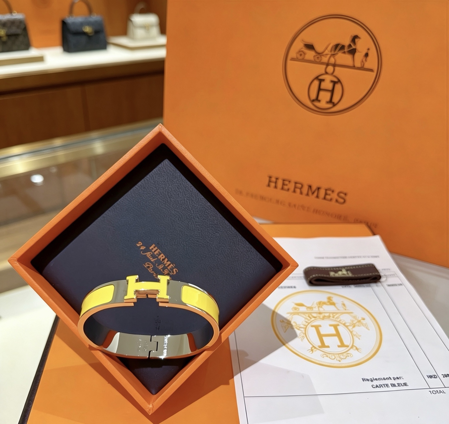 Bracciale Hermes Clic H in metallo placcato palladio con smalto giallo PM
