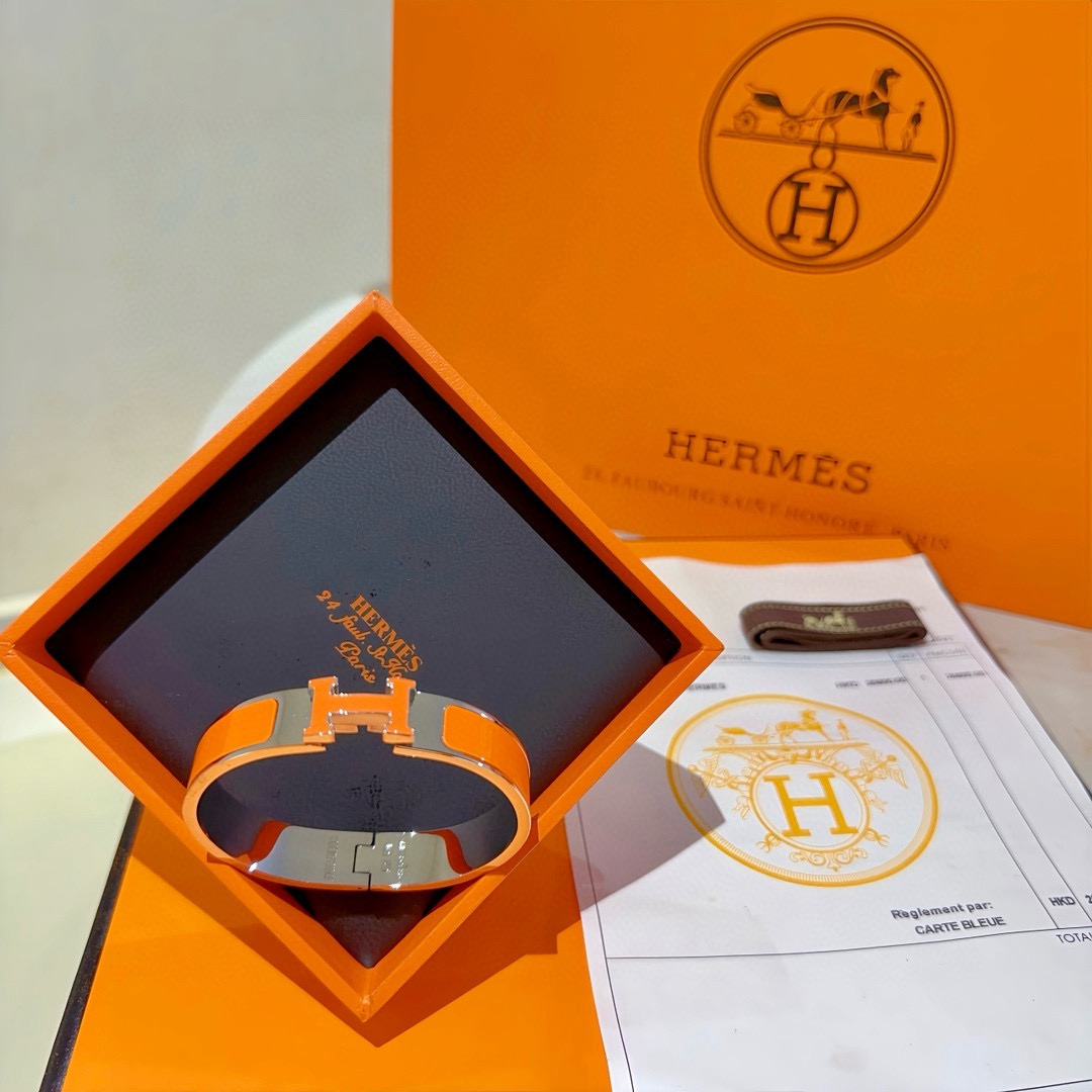 Bracciale Hermes Clic H in metallo argentato placcato palladio smalto arancione PM