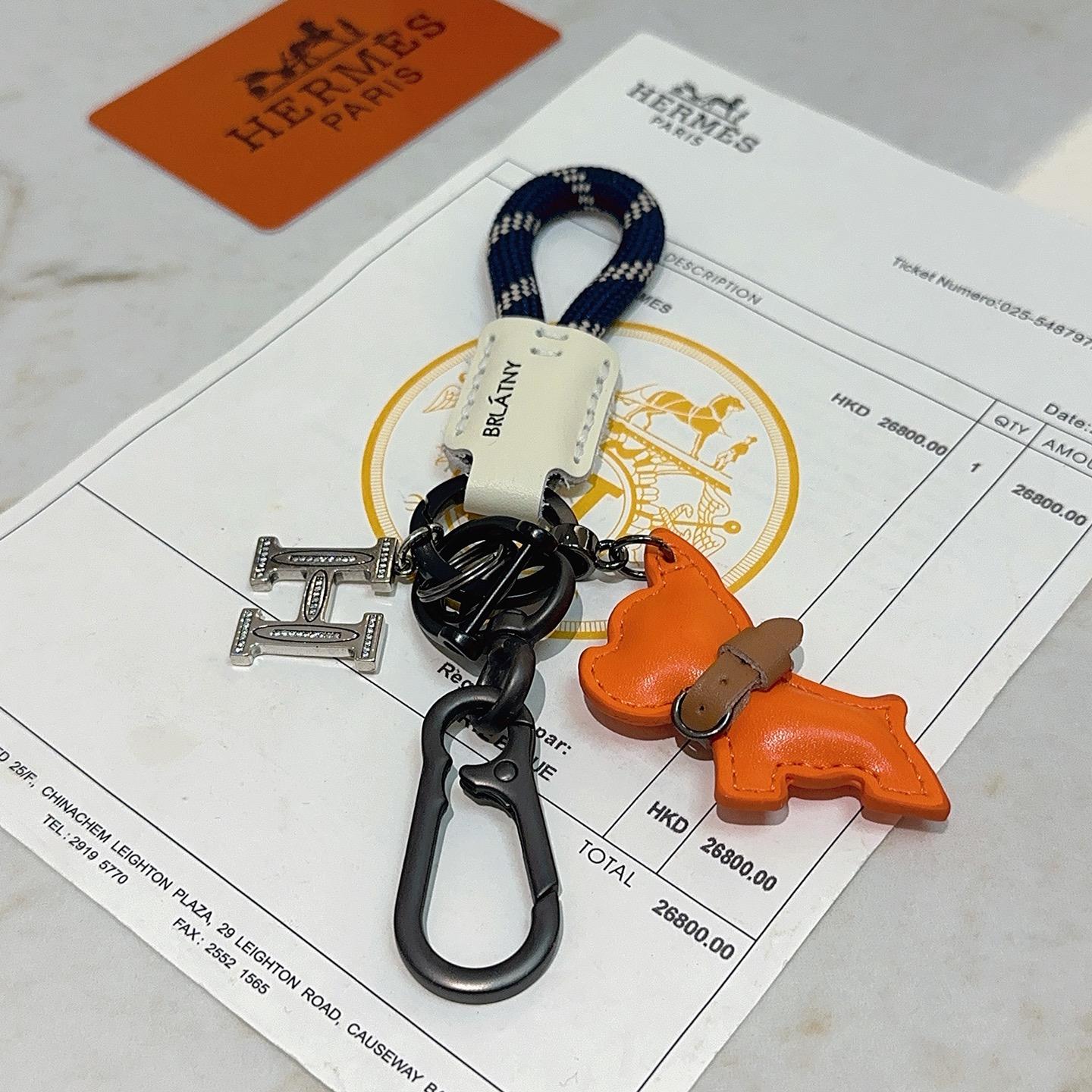 Hermes Rodeo Horse Charm Porte-clés pendentif Breloque cheval en cuir orange avec accents bleus bracelet en cuir marron cordon tressé vert foncé matériel en bronze à canon breloque de sac d'argent doré breloque logo H argenté 10 cm de longueur totale