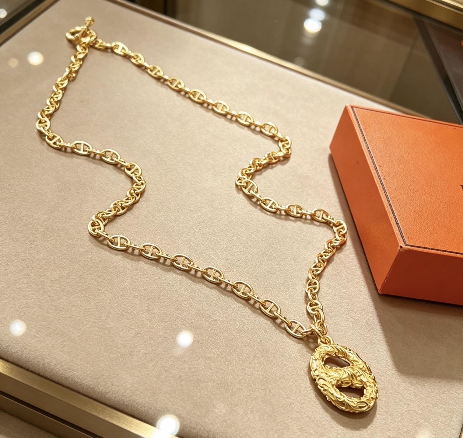 Collana Hermes Pretzel Ciondolo Chaine d'Ancre in metallo color oro 60 cm