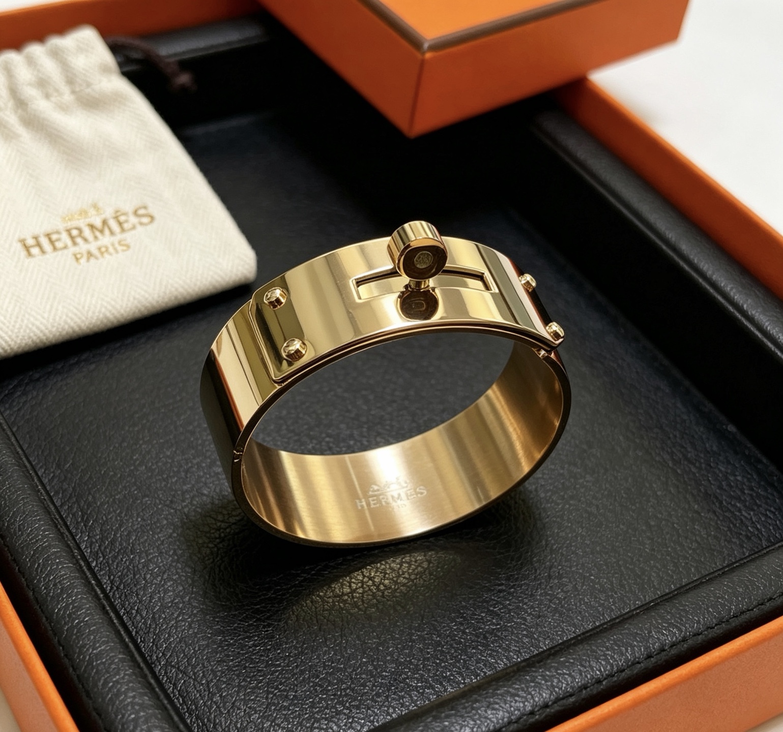 Bracciale Hermes Kelly in metallo color oro 21 mm