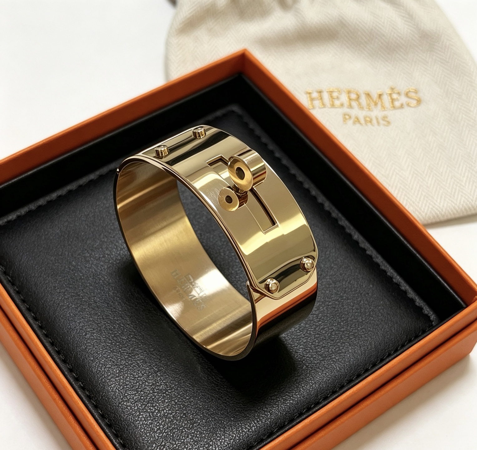 Bracciale Hermes Kelly in metallo color oro 21 mm