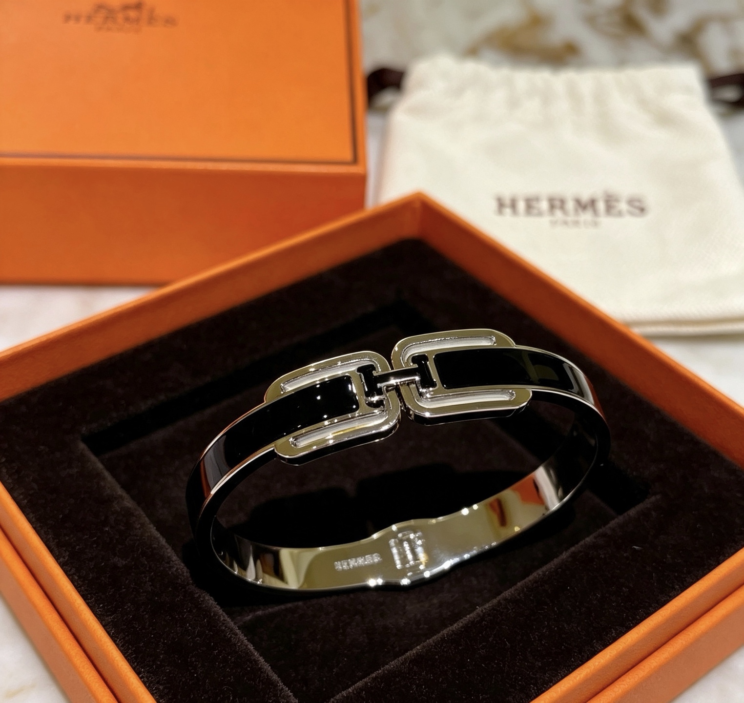 Bracciale Hermes Clic H Metallo argentato con smalto nero 17 cm