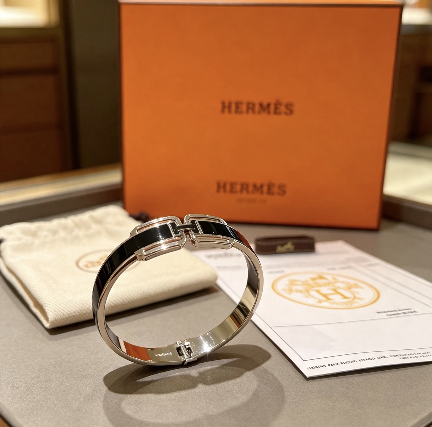 Bracciale Hermes Clic H Metallo argentato con smalto nero 17 cm