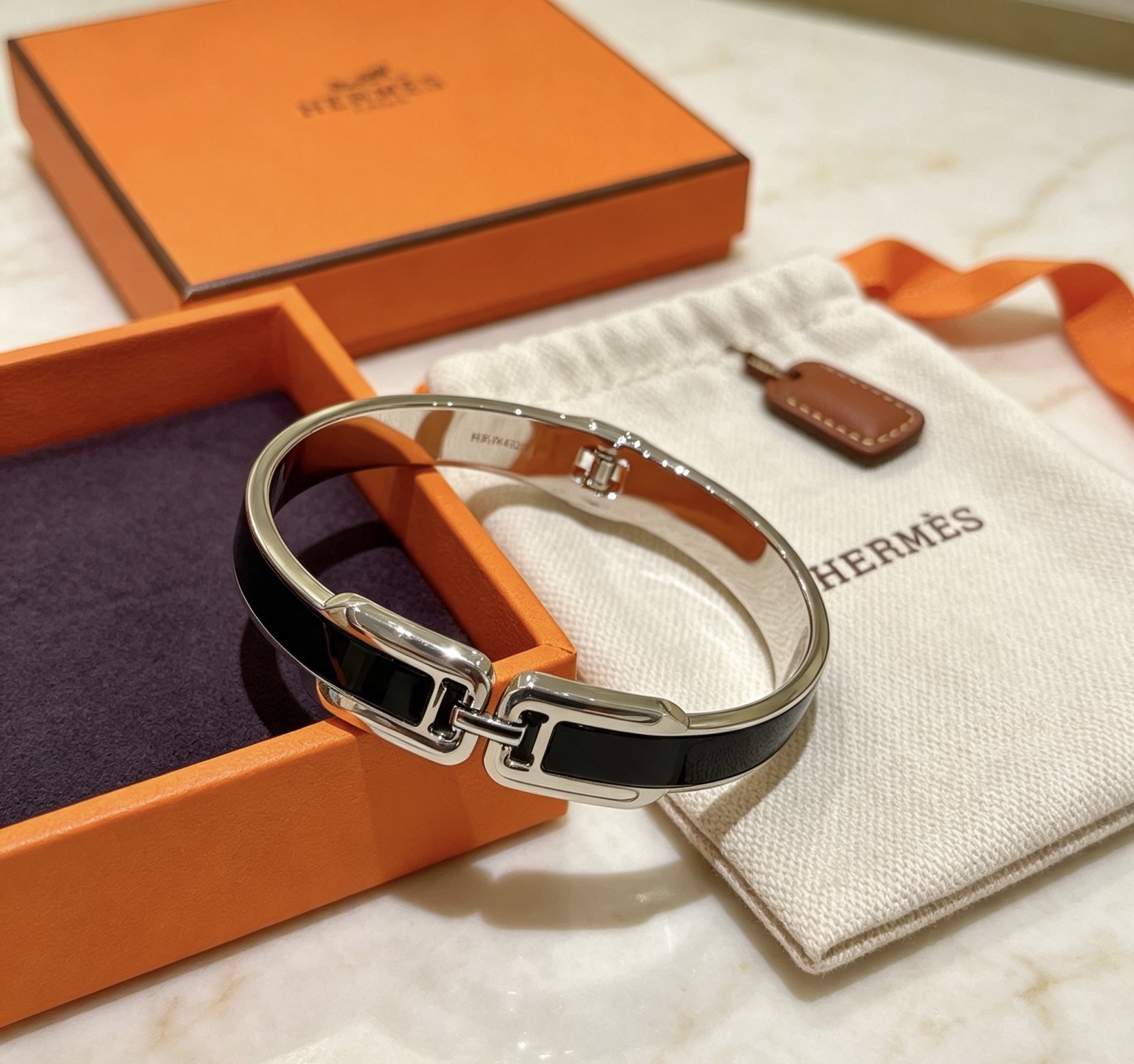 Bracciale Hermes Clic H Metallo argentato con smalto nero 17 cm