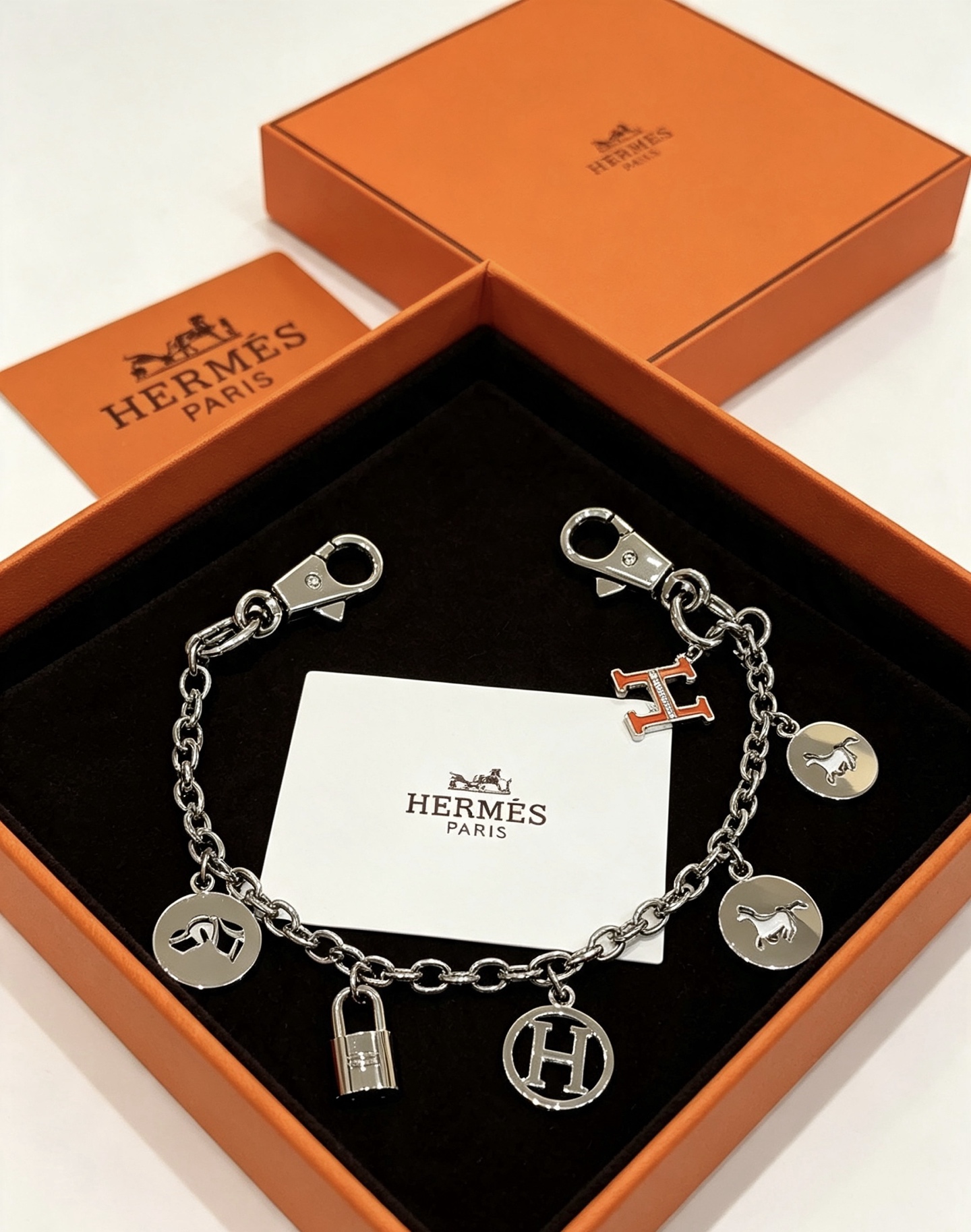 Ciondolo Hermes Olga Multi-Charm Bag Charm Metallo color argento con accento smaltato arancione 18 cm