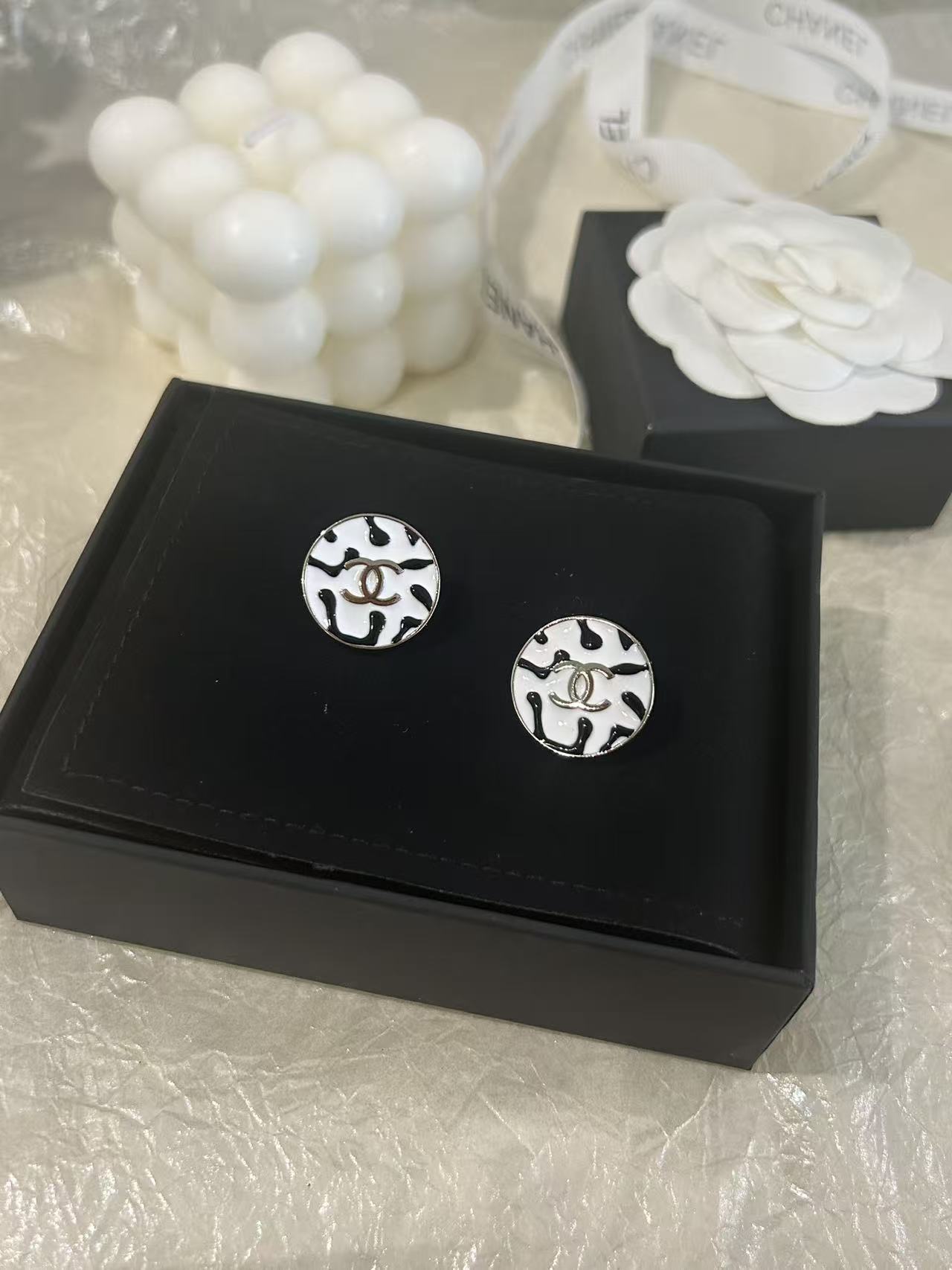 Chanel CC Logo Round Stud Earrings earrings silver-tone metal white enamel with black spotted pattern 1 5cm diameter