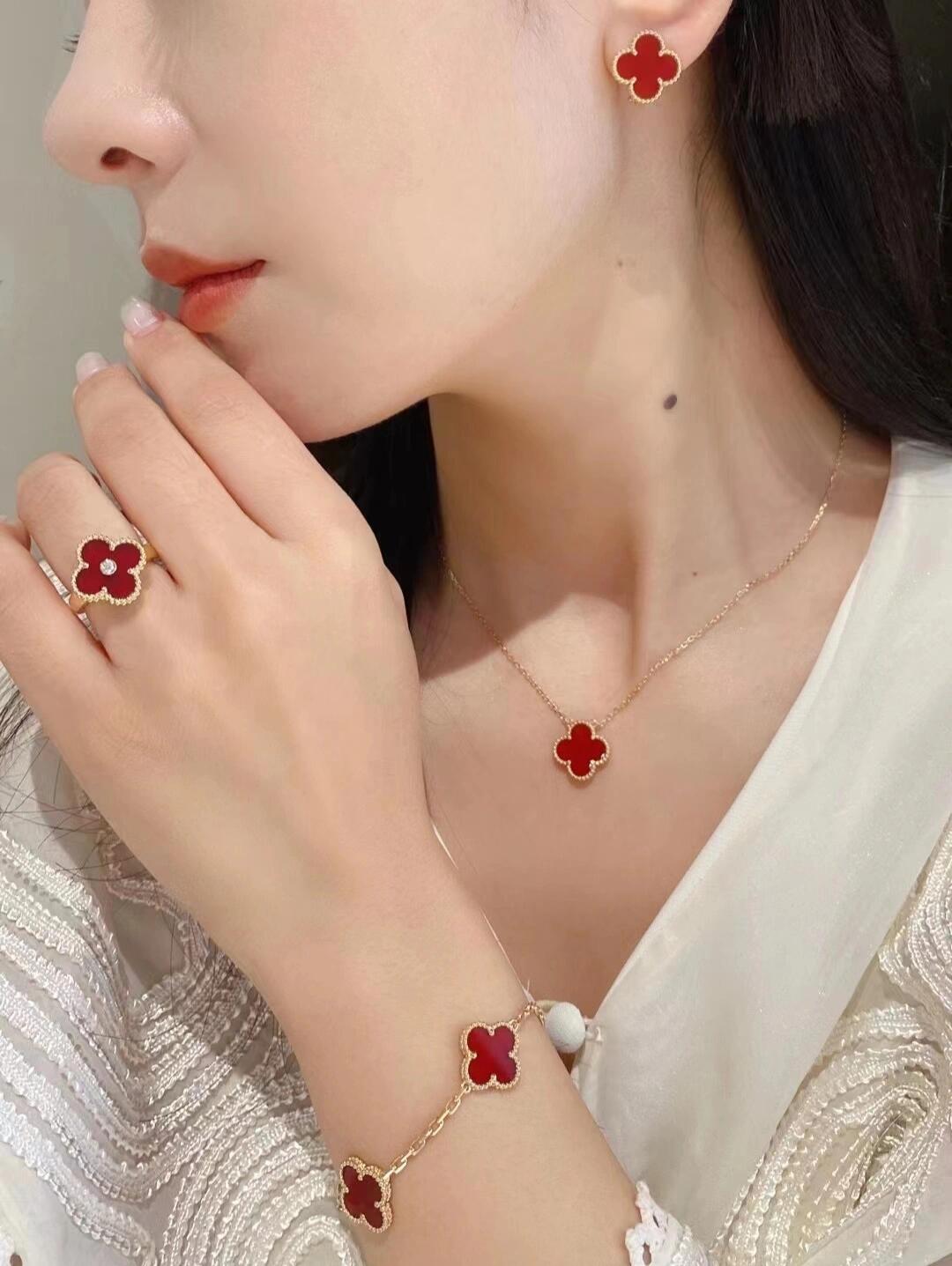 Van Cleef Arpels Sweet Alhambra earrings 18k yellow gold with carnelian red stone 9 5mm stud diameter
