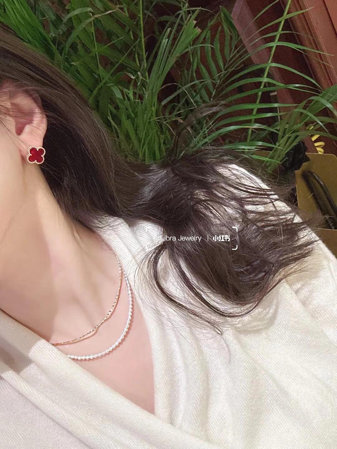 Van Cleef Arpels Sweet Alhambra earrings 18k yellow gold with carnelian red stone 9 5mm stud diameter