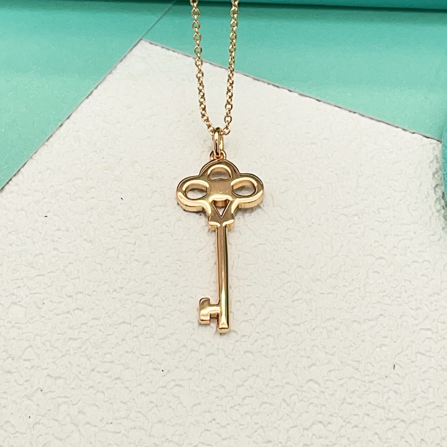 Tiffany Co Tiffany Keys Crown Key Pendant necklace 18k rose gold with clear diamond accents 18 inches