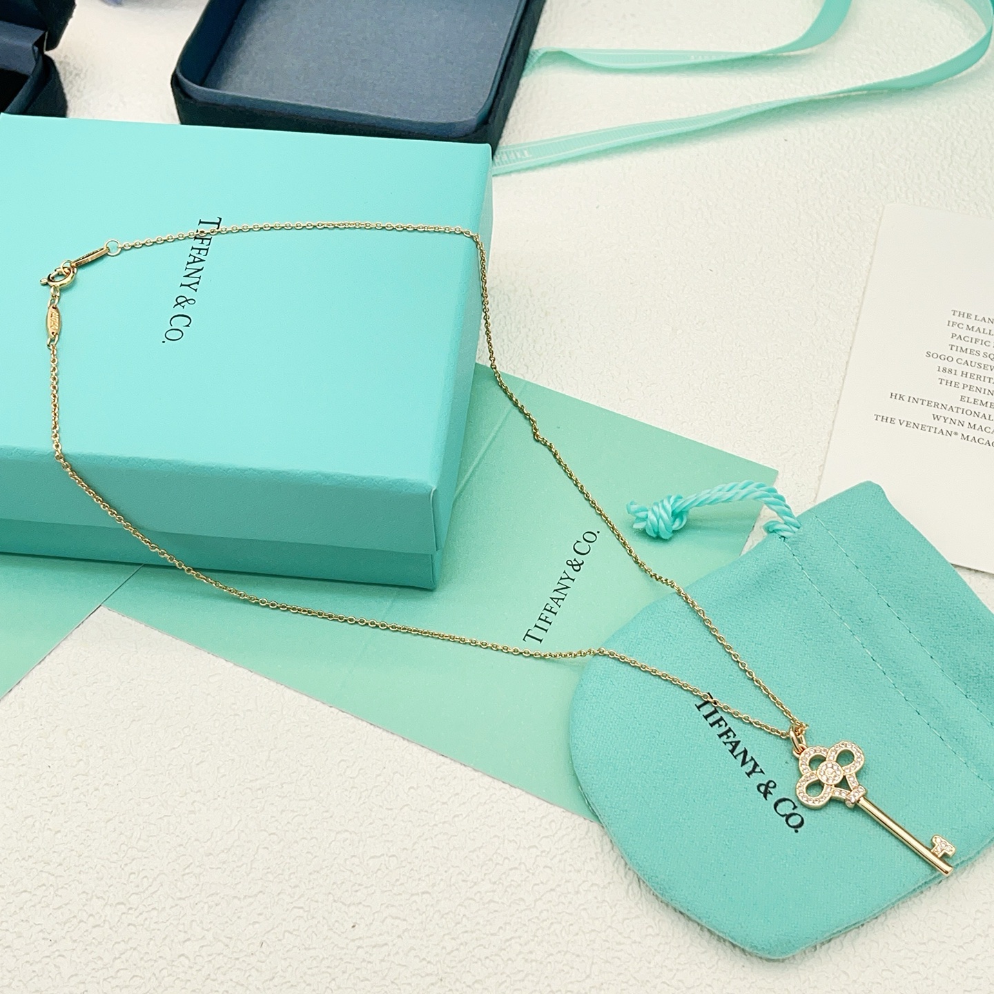 Tiffany Co Tiffany Keys Crown Key Pendant necklace 18k rose gold with clear diamond accents 18 inches