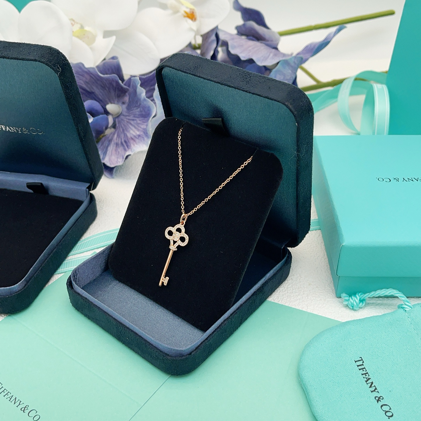 Tiffany Co Tiffany Keys Crown Key Pendant necklace 18k rose gold with clear diamond accents 18 inches