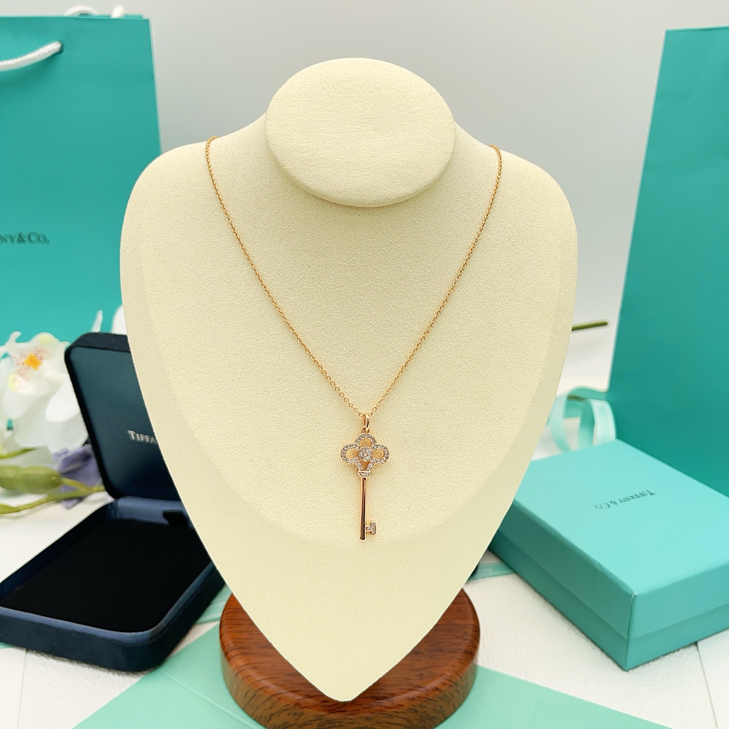 Tiffany Co Tiffany Keys Crown Key Pendant necklace 18k rose gold with clear diamond accents 18 inches