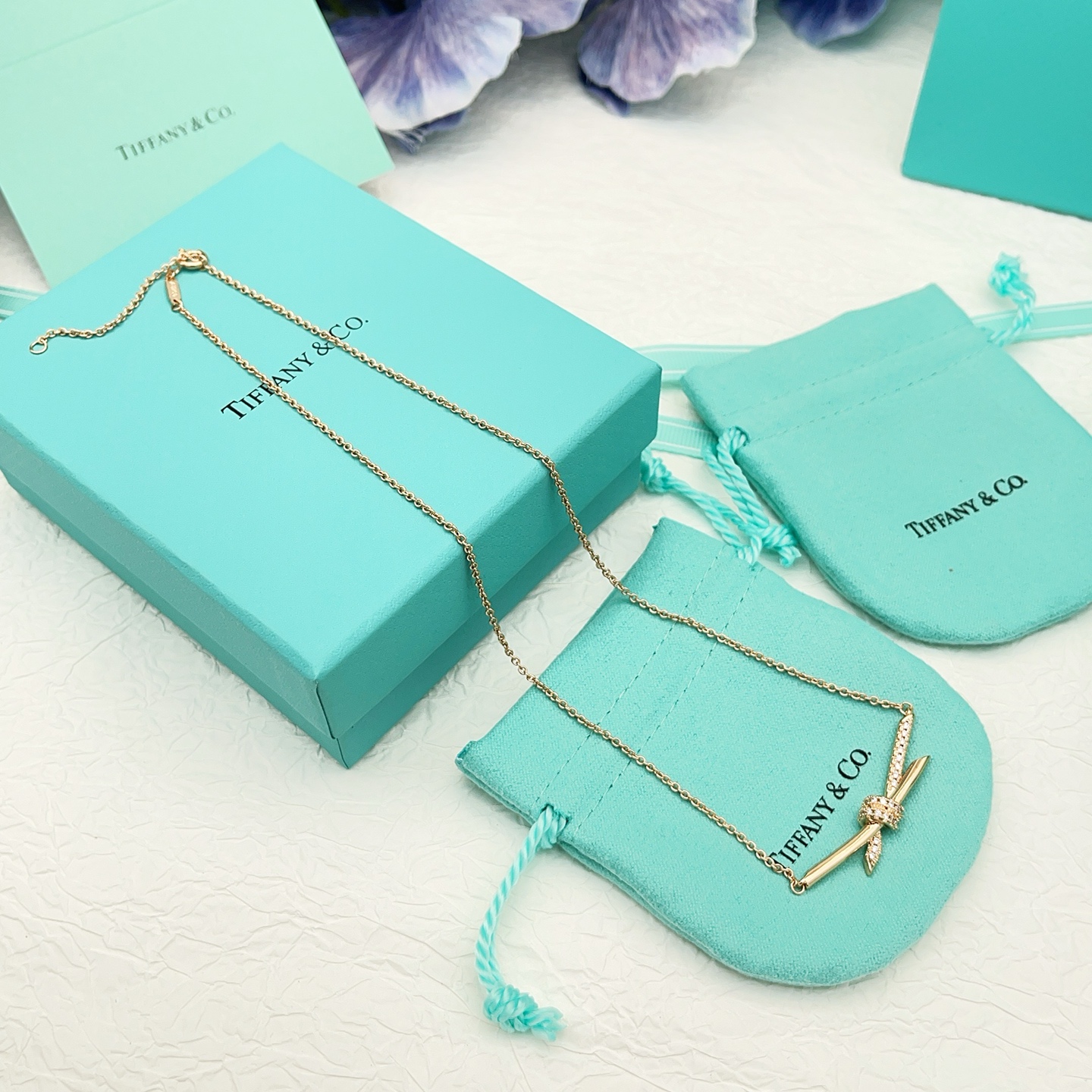 Tiffany Co Knot necklace 18k rose gold with clear diamonds 16 inches