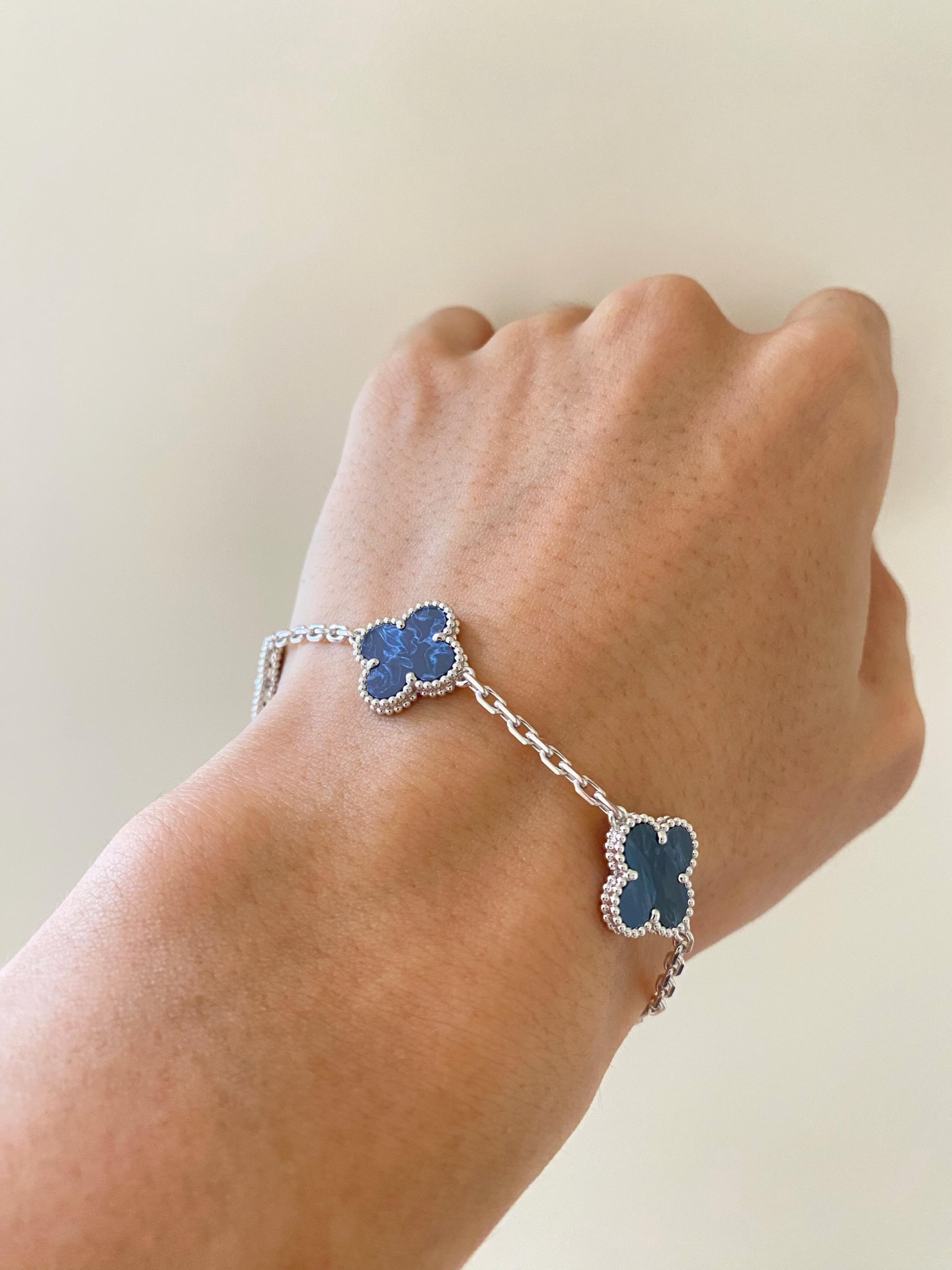 Van Cleef Arpels Alhambra bracelet silver-toned metal with dark blue pietersite clover motifs 18cm