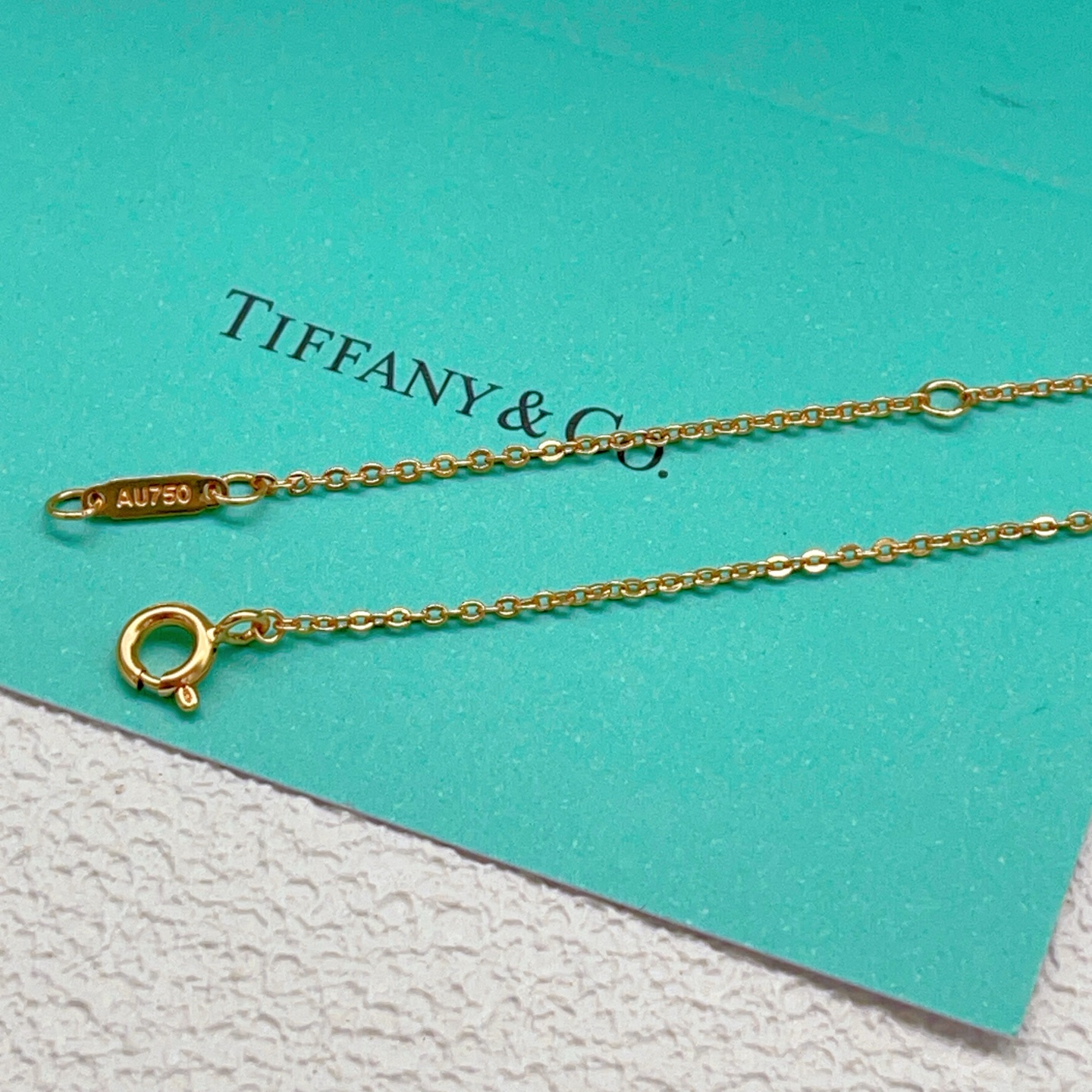 Tiffany Co Schlumberger Lynn Pendant necklace 18k yellow gold with platinum set round brilliant diamonds 40cm with 5cm extender