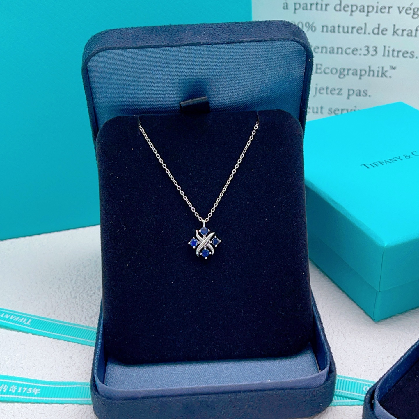 Tiffany Co Signature Cross Sapphire Pendant necklace Sterling silver with blue sapphire stones 16 inches with 2 inch extender