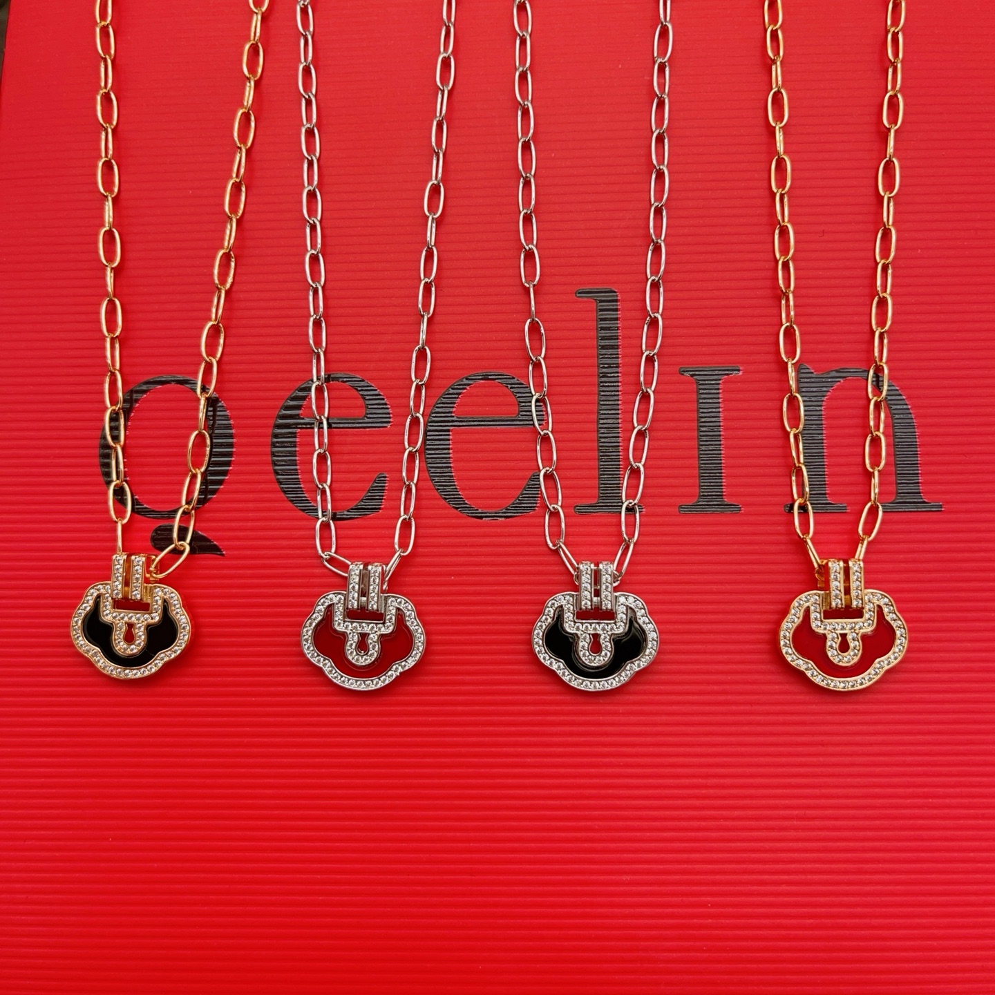 Qeelin Yu Yi necklace 18K rose gold with black onyx and diamond accents 18K white gold with red carnelian and diamond accents 18K white gold with black onyx and diamond accents 18K rose gold with red carnelian and diamond accents 45cm
