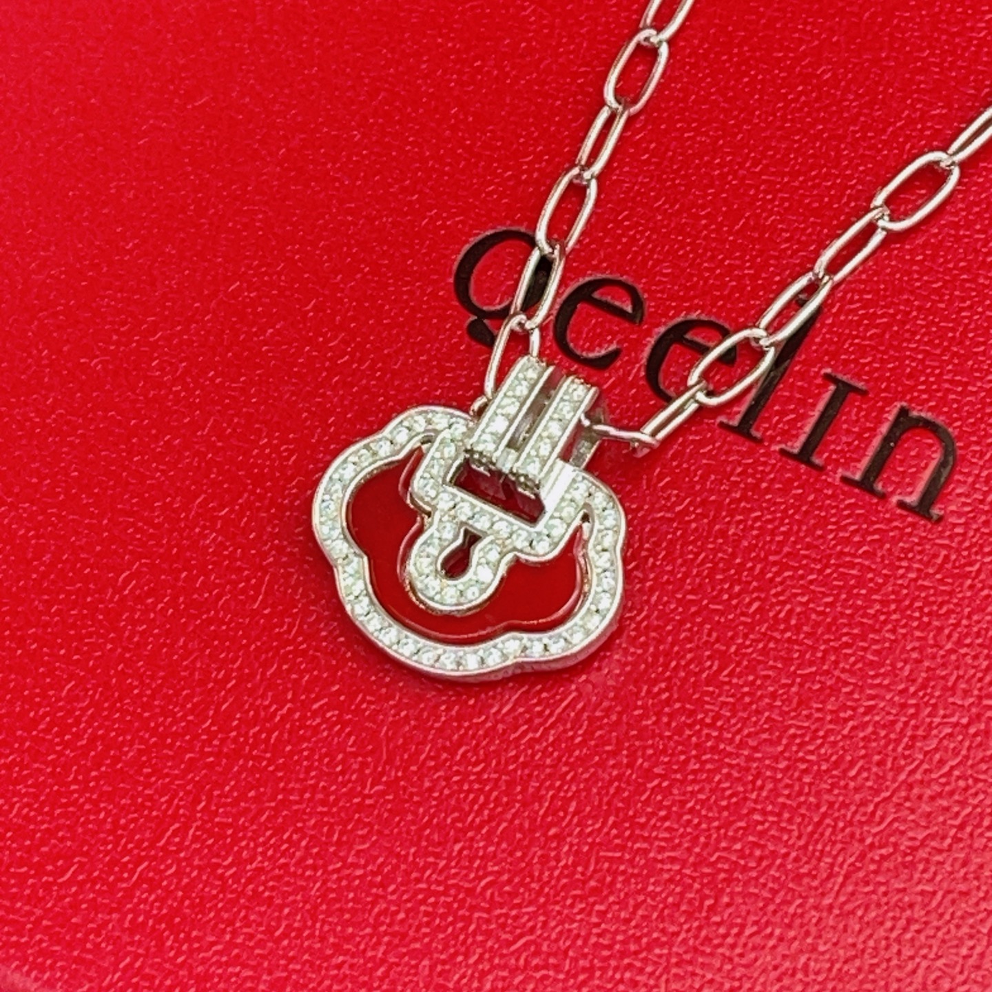 Qeelin Yu Yi necklace silver-toned metal red enamel clear diamond-like stones 42cm