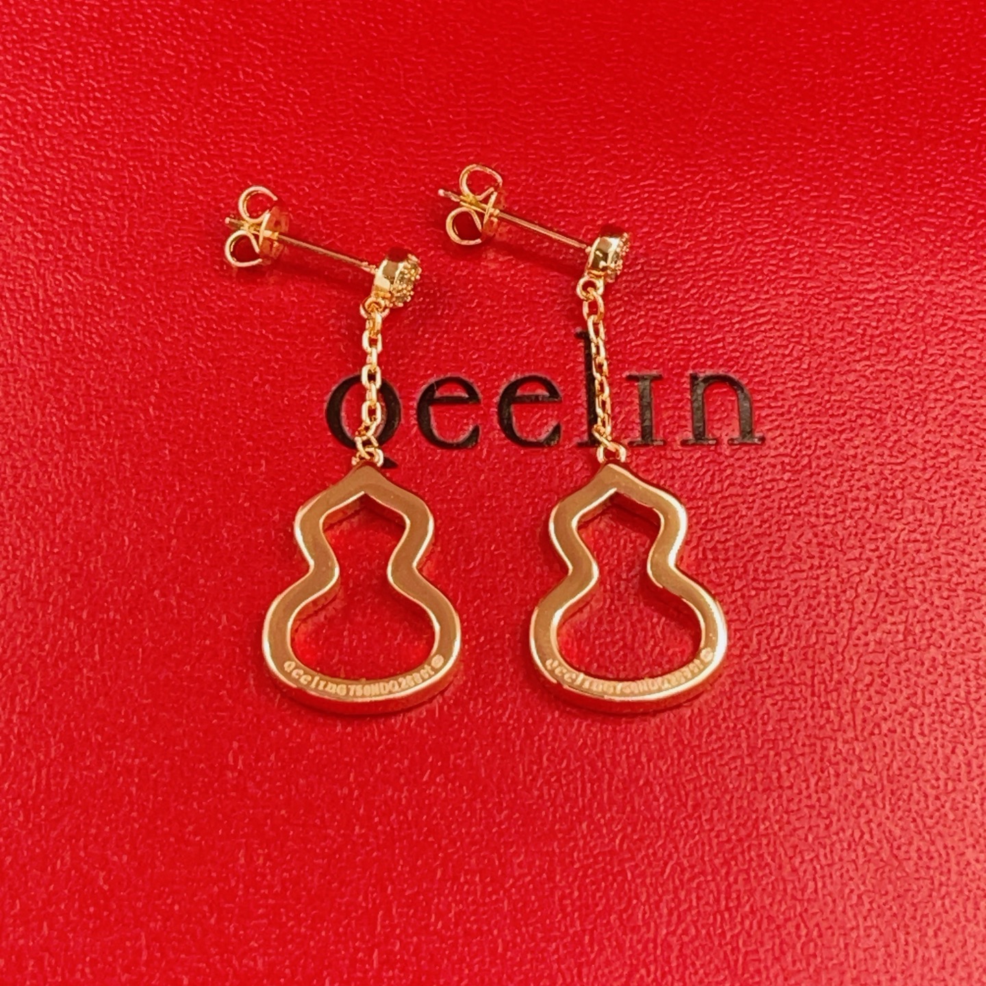Qeelin Wulu earrings 18k rose gold with clear diamond accents 3cm drop length
