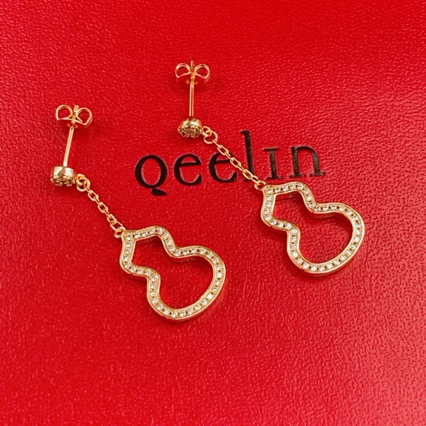 Qeelin Wulu earrings 18k rose gold with clear diamond accents 3cm drop length