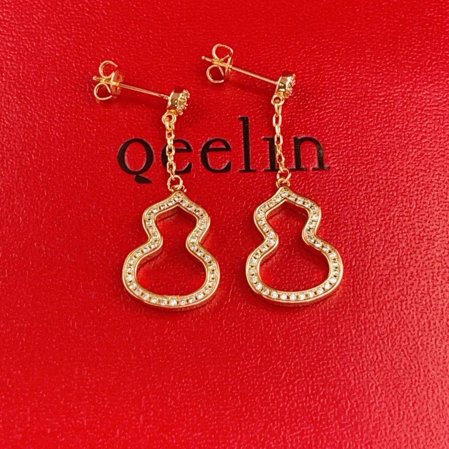 Qeelin Wulu earrings 18k rose gold with clear diamond accents 3cm drop length