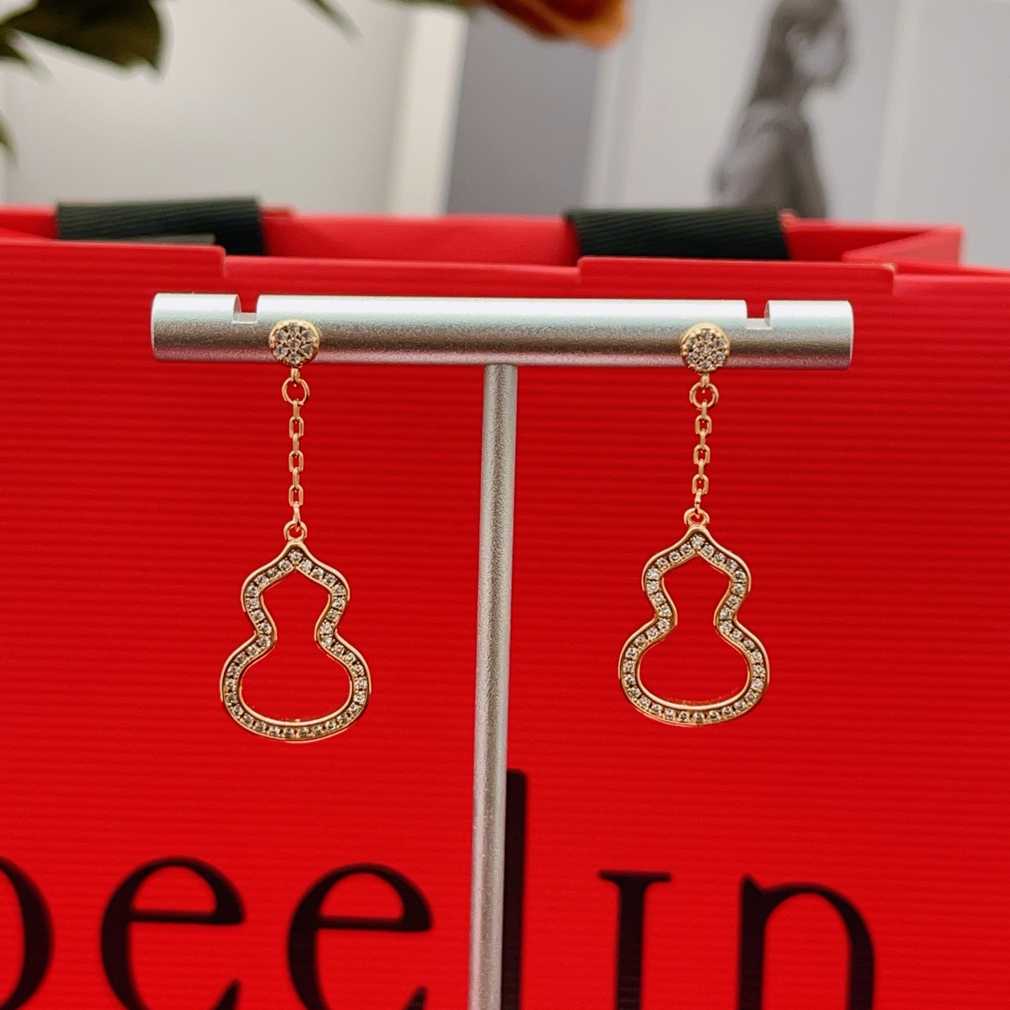 Qeelin Wulu earrings 18k rose gold with clear diamond accents 3cm drop length