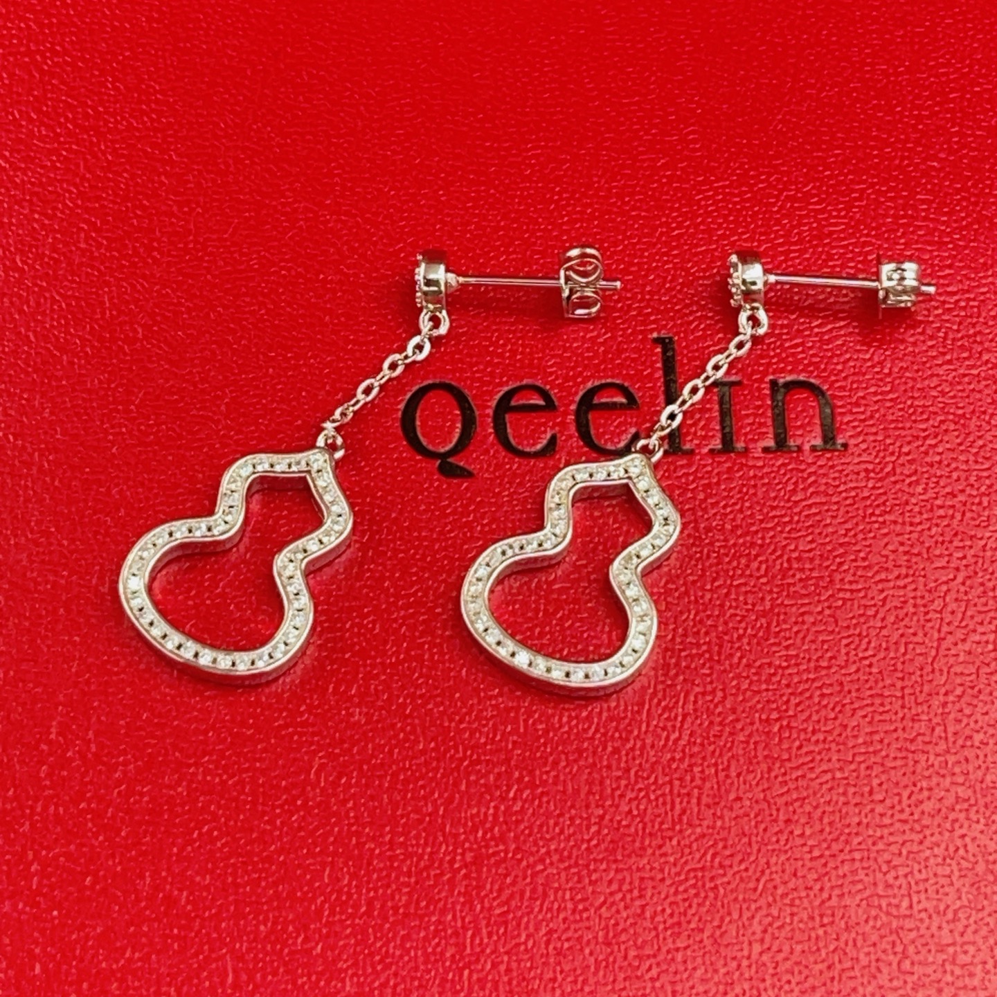 Qeelin Wulu earrings silver-toned white gold with clear diamond accents 2 5cm drop length