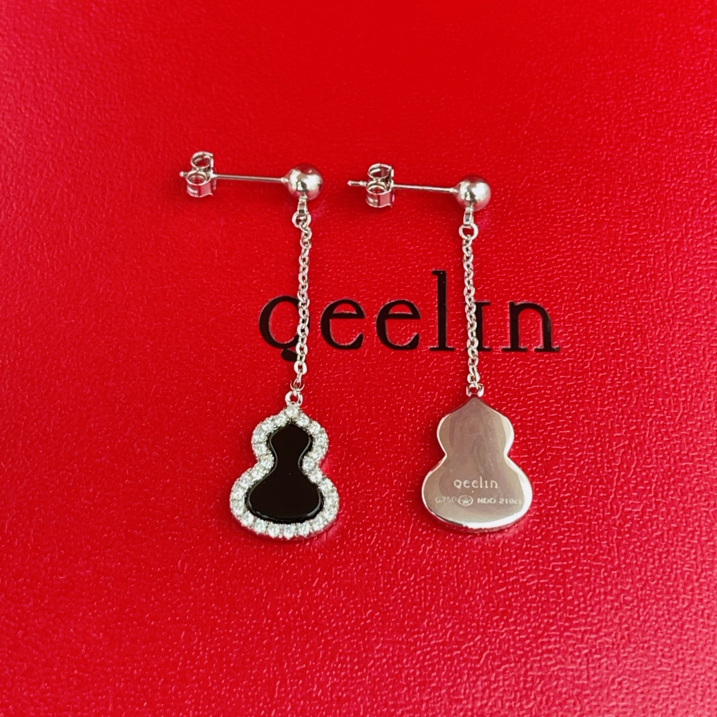 Qeelin Wulu earrings silver-toned white gold with black onyx and clear diamond accents 3cm drop length