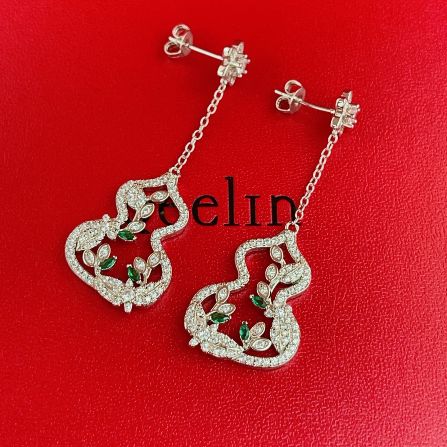 Qeelin Wulu earrings 18K white gold with diamonds and emeralds 4cm drop length