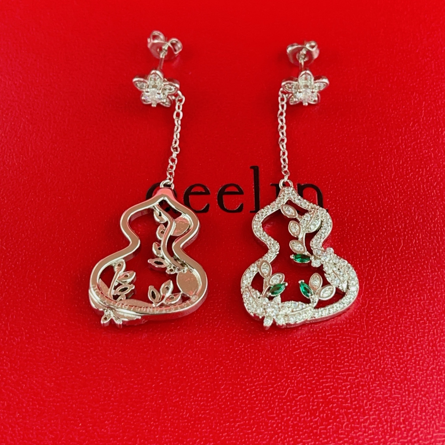 Qeelin Wulu earrings 18K white gold with diamonds and emeralds 4cm drop length