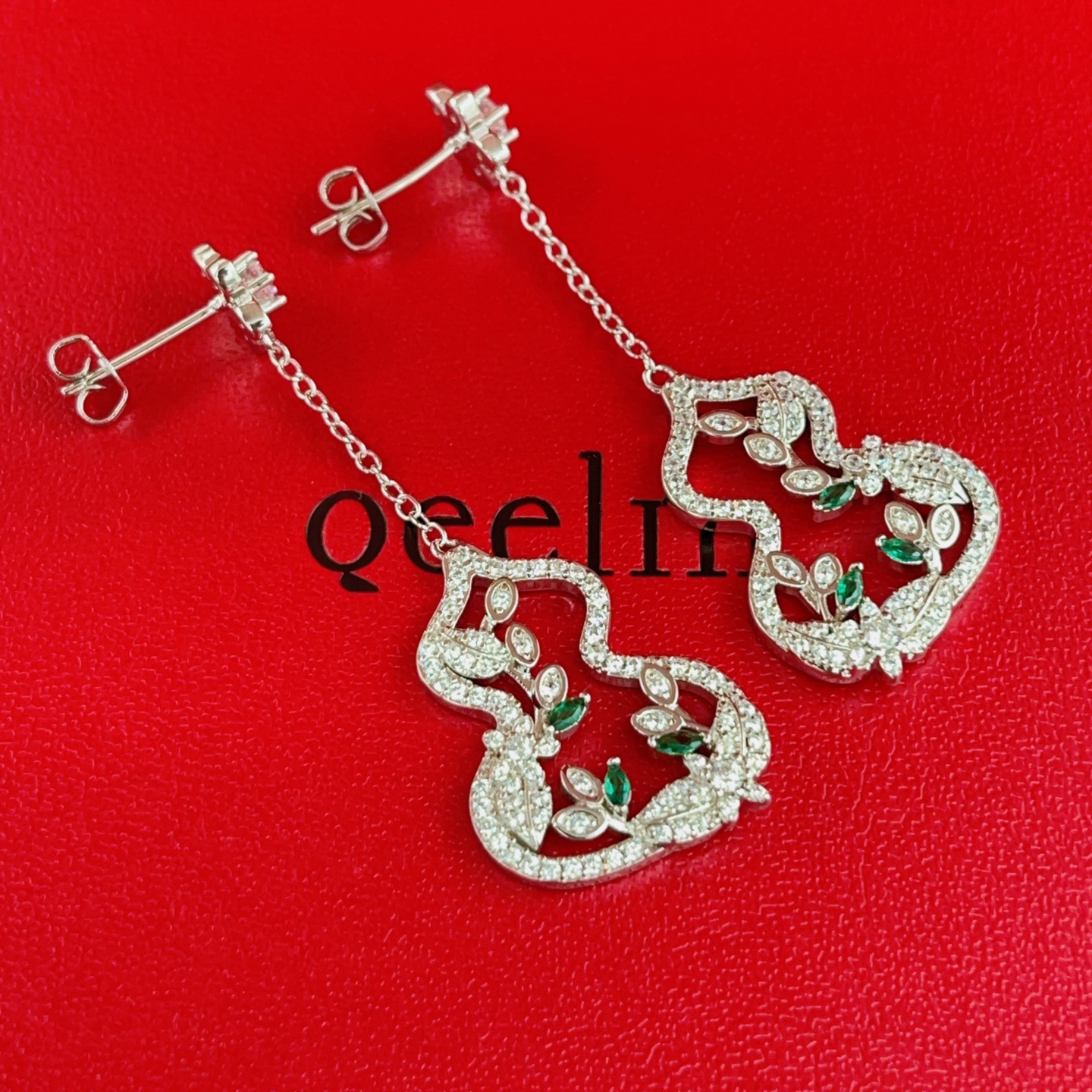 Qeelin Wulu earrings 18K white gold with diamonds and emeralds 4cm drop length