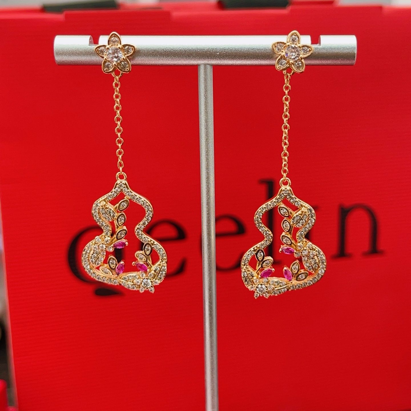 Qeelin Wulu Garden earrings rose gold metal with clear diamonds and ruby red gemstones 4 5cm drop length