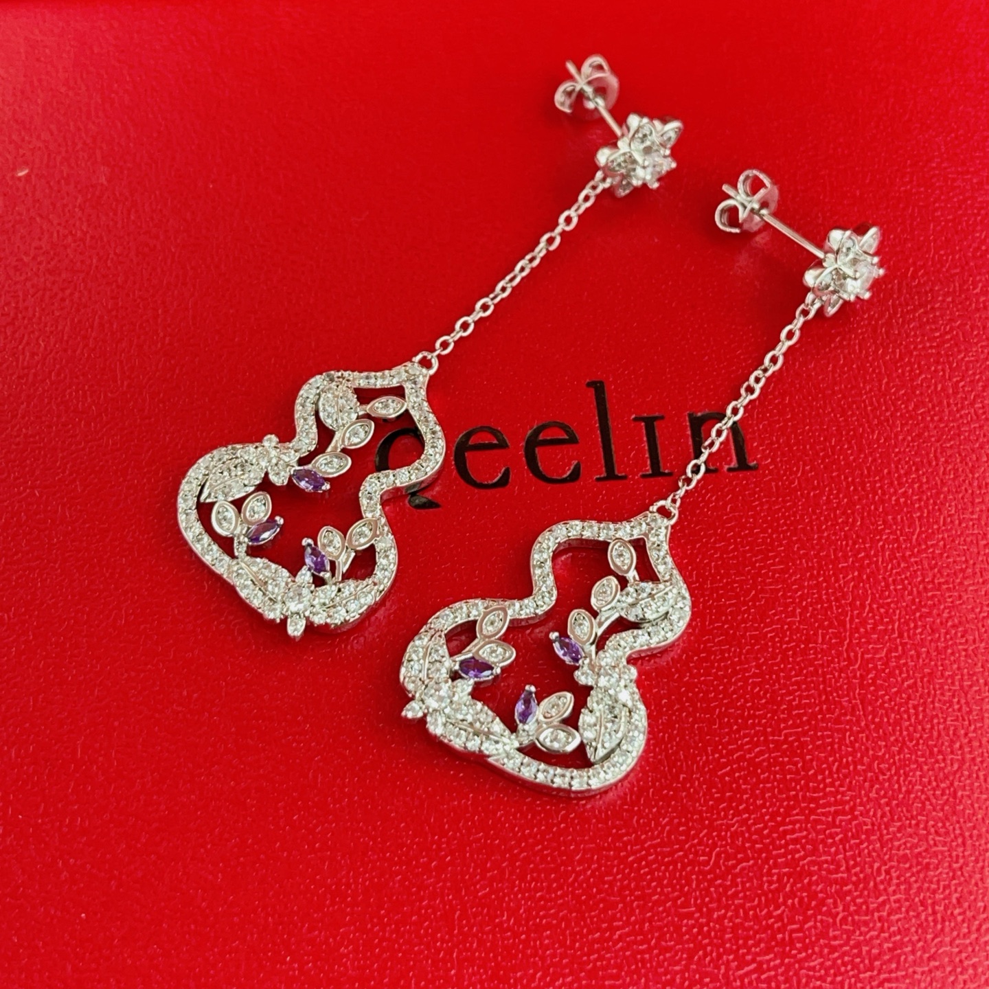 Qeelin Wulu earrings silver-toned white gold with clear diamonds and purple gemstones 4cm drop length
