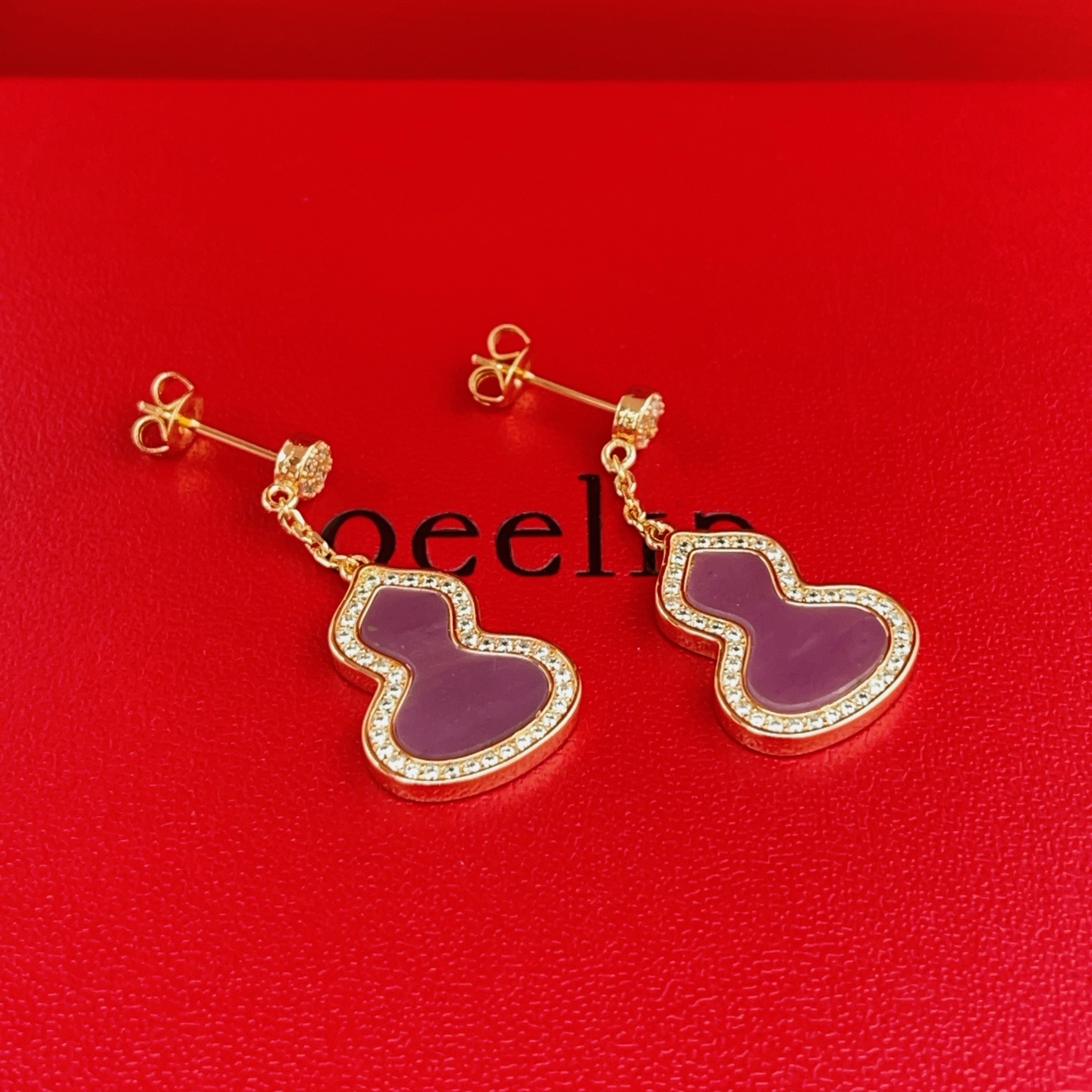 Qeelin Wulu earrings 18K rose gold purple gemstone clear diamond accents 2 5cm drop length