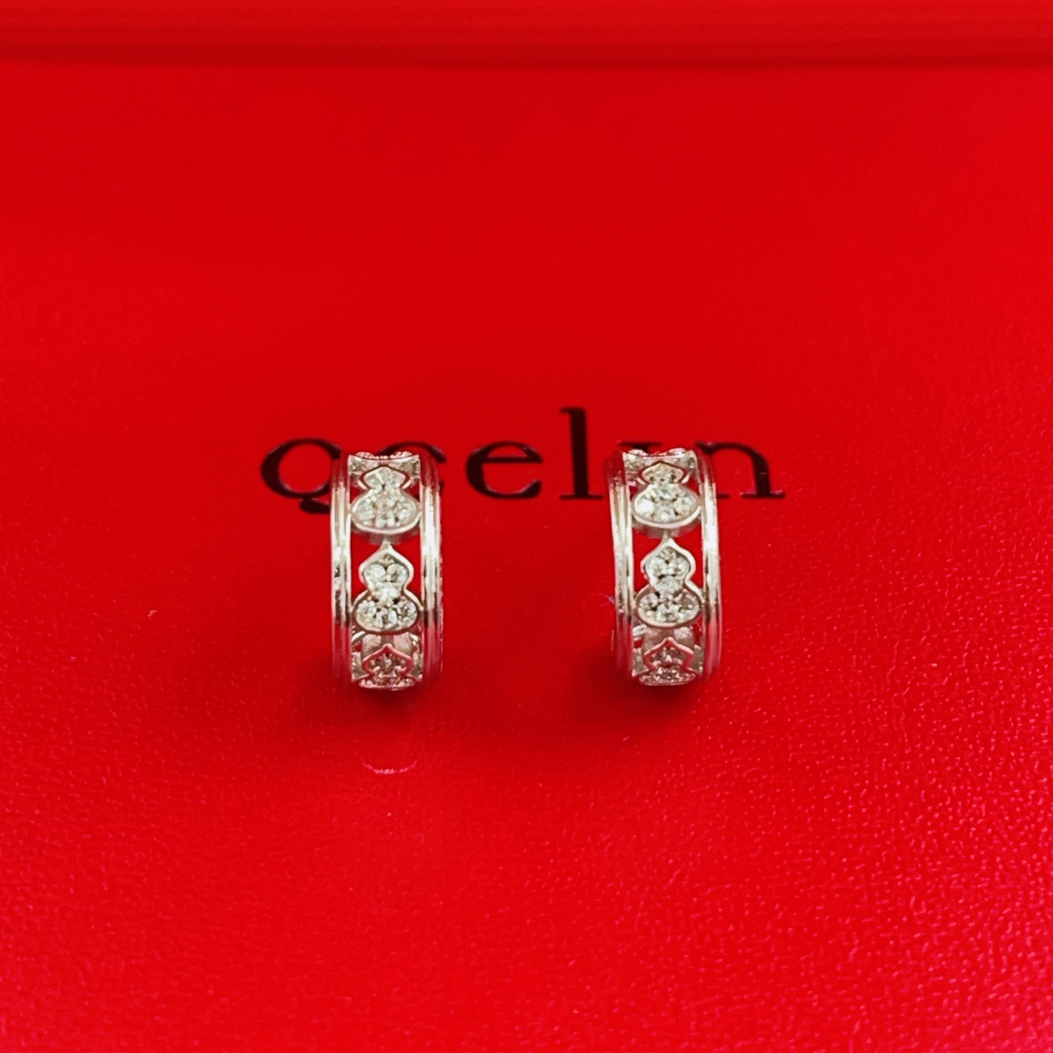 Qeelin Wulu earrings 18K white gold with clear diamond accents 10mm outer diameter