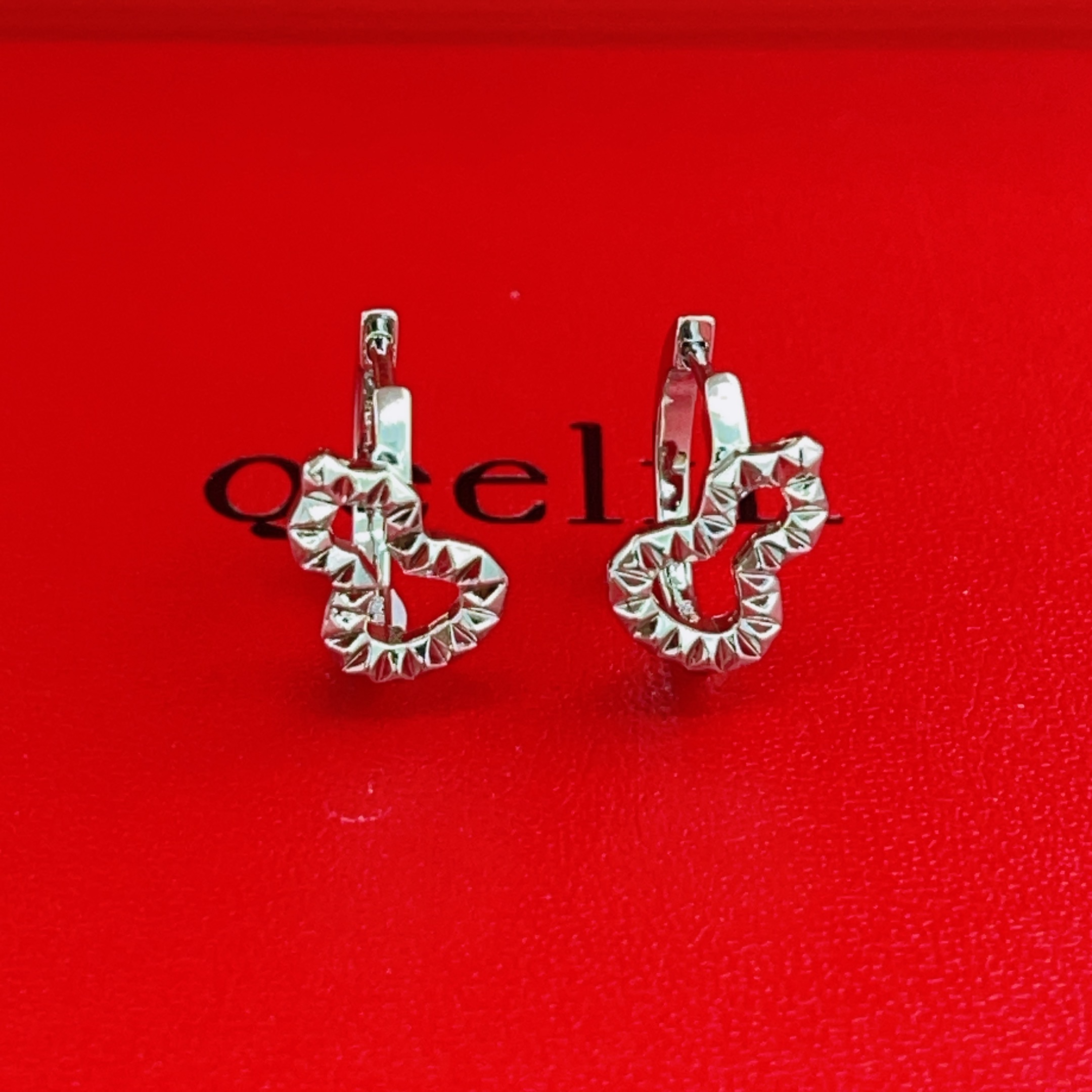 Qeelin Wulu earrings silver-toned metal no gemstones 10mm hoop diameter