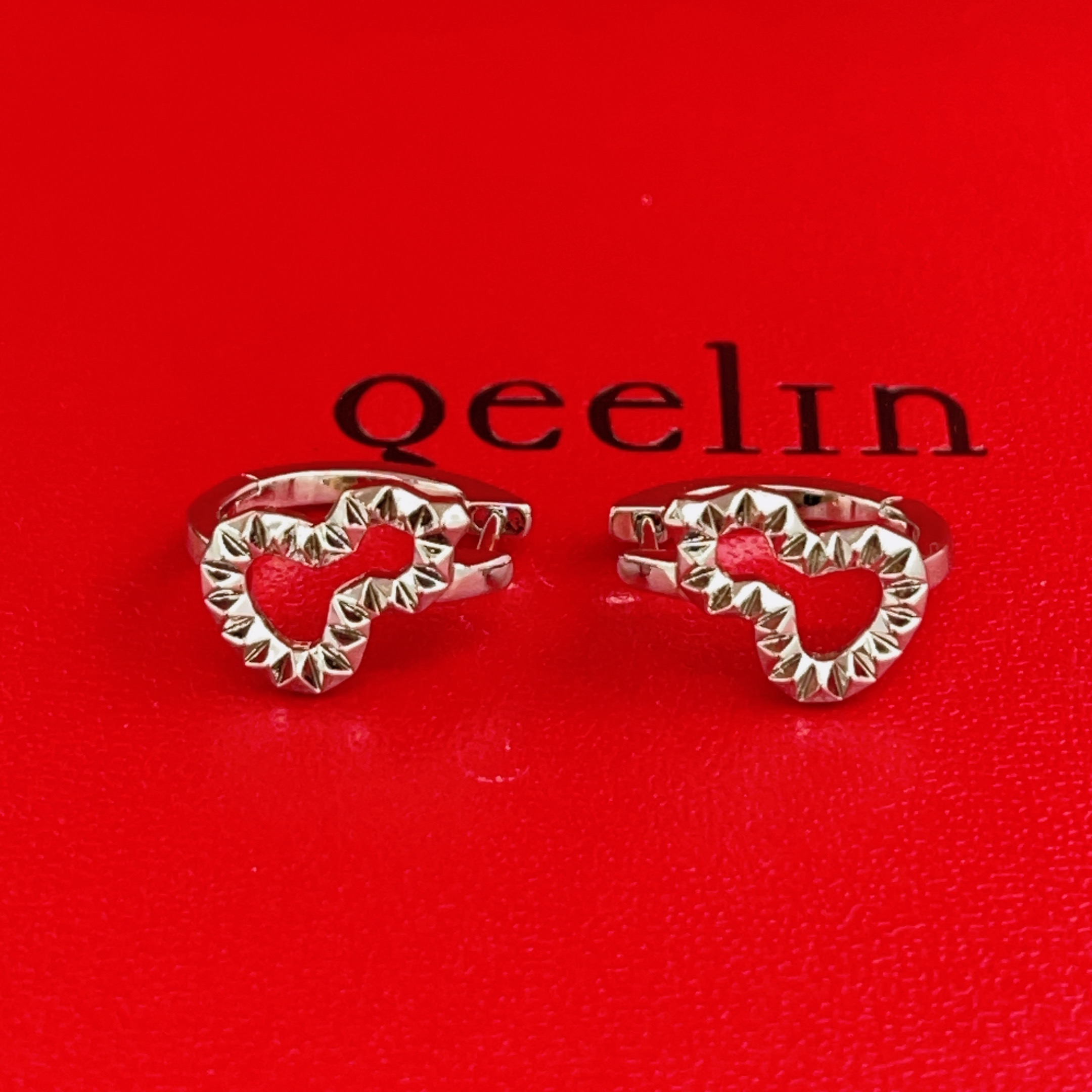 Qeelin Wulu earrings silver-toned metal no gemstones 10mm hoop diameter