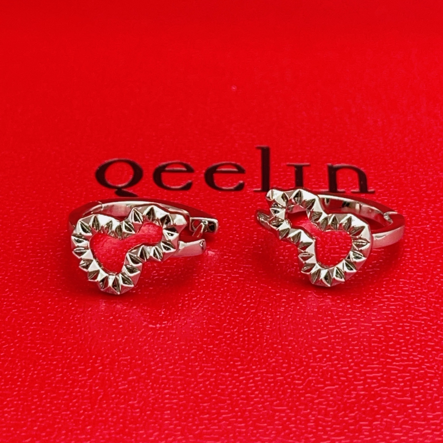 Qeelin Wulu earrings silver-toned metal no gemstones 10mm hoop diameter
