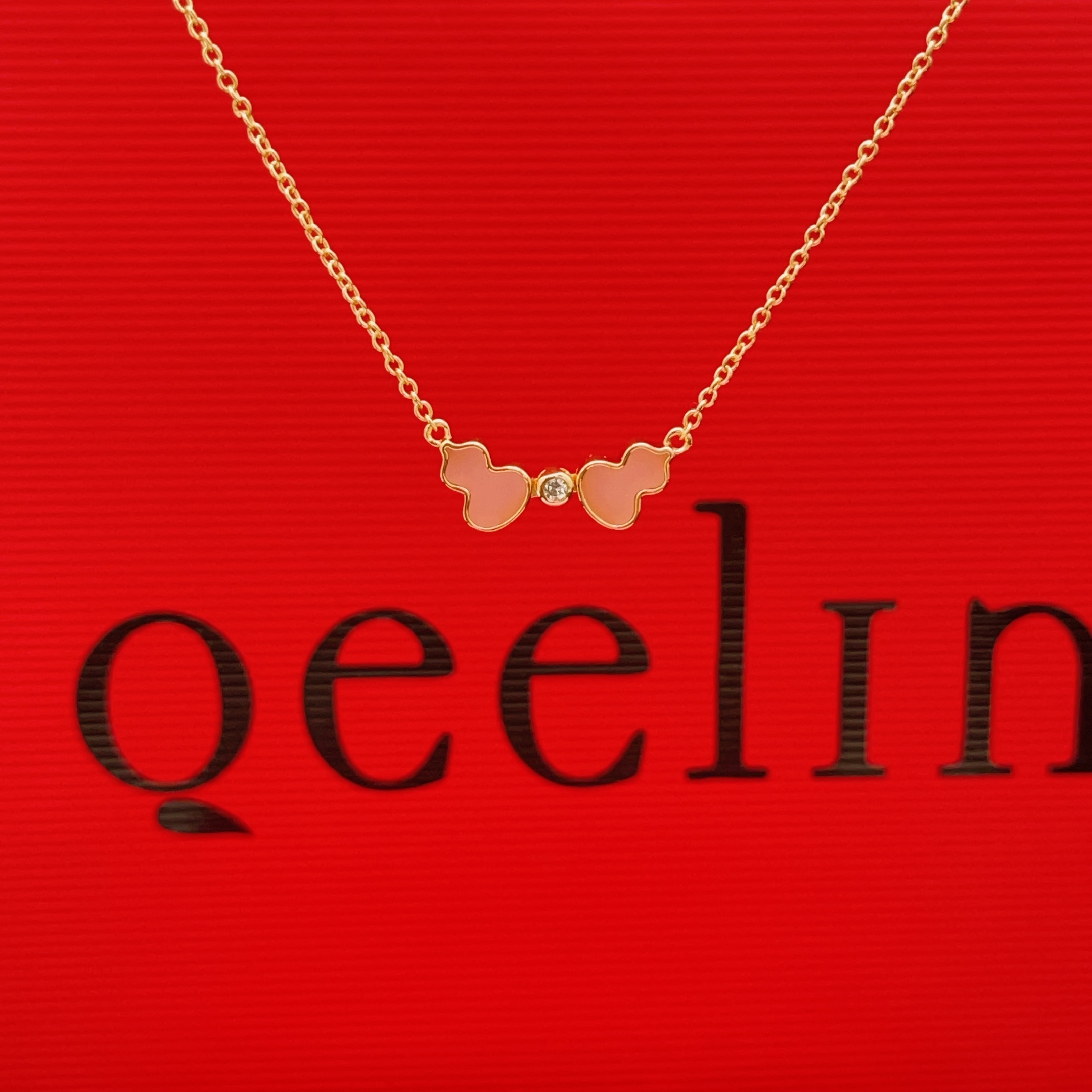 Qeelin Wulu necklace rose gold metal pink opal inlay clear diamond accent 42cm