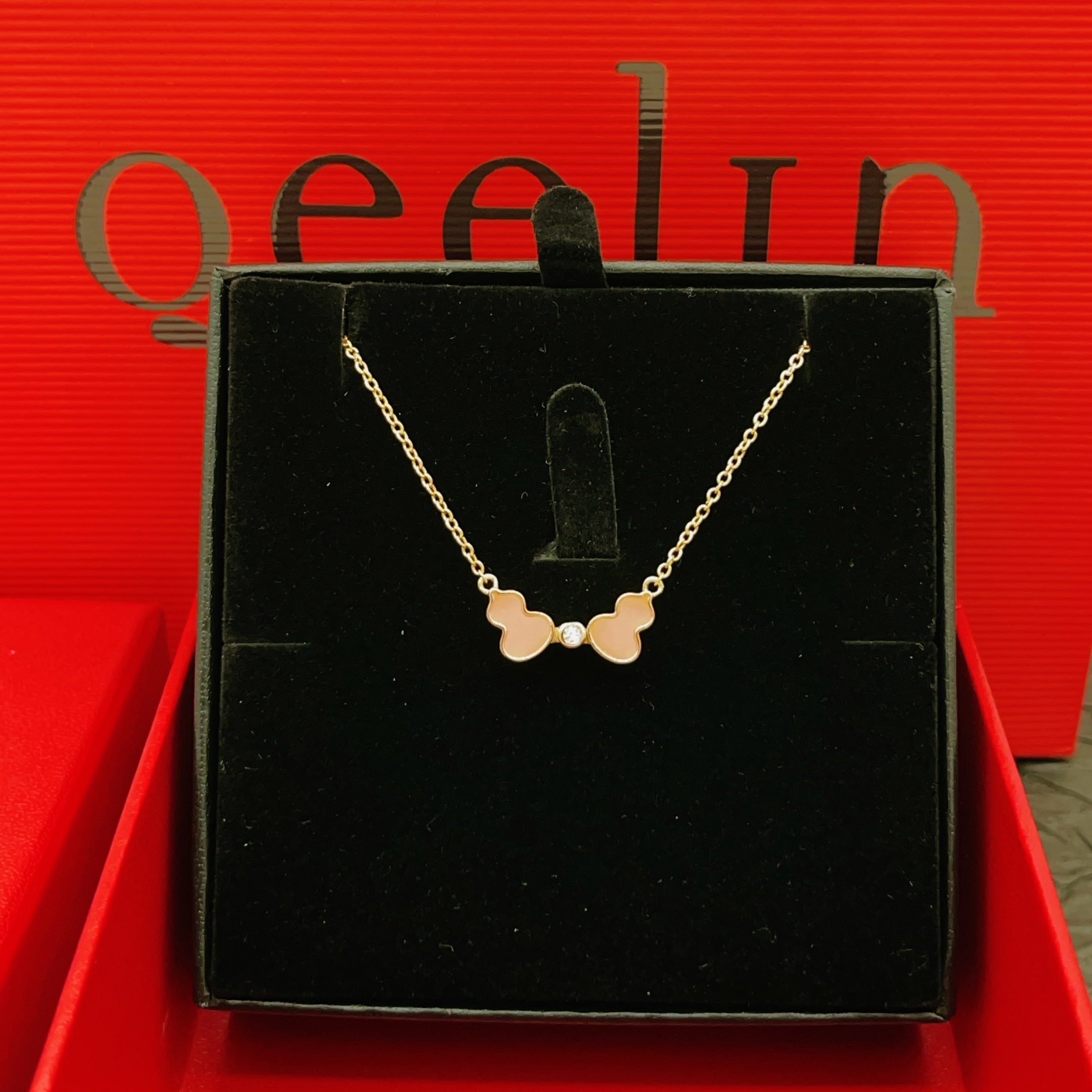 Qeelin Wulu necklace rose gold metal pink opal inlay clear diamond accent 42cm