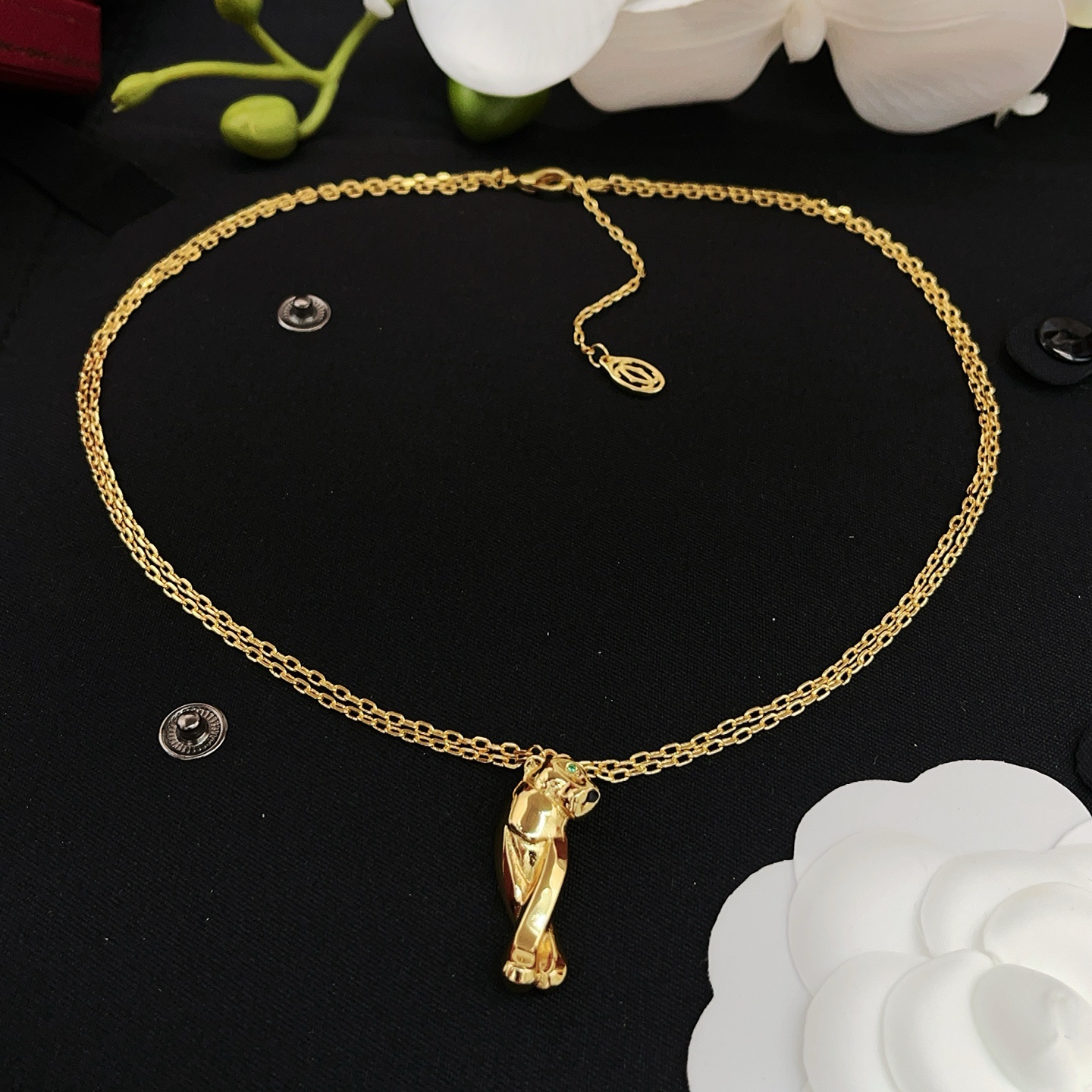 Cartier Panthere de Cartier necklace 18K yellow gold green tsavorite garnet eyes black onyx nose 42cm