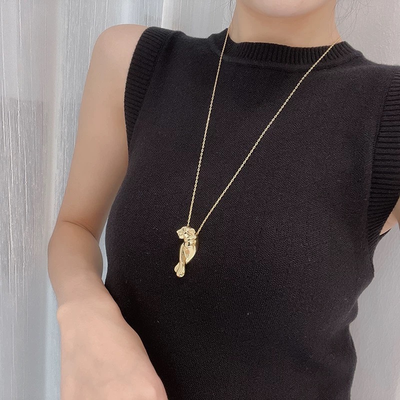 Cartier Panthere de Cartier necklace 18K yellow gold green tsavorite garnet eyes black onyx nose 42cm