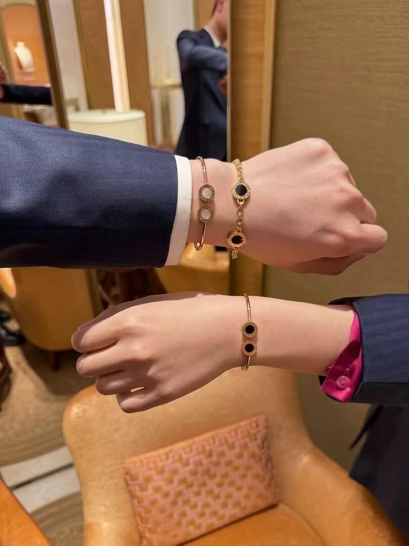 Bvlgari Bvlgari Bvlgari Open Cuff Bangle bracelet Available in rose gold yellow gold silver metal options with white mother-of-pearl or black onyx stone inlays 17cm