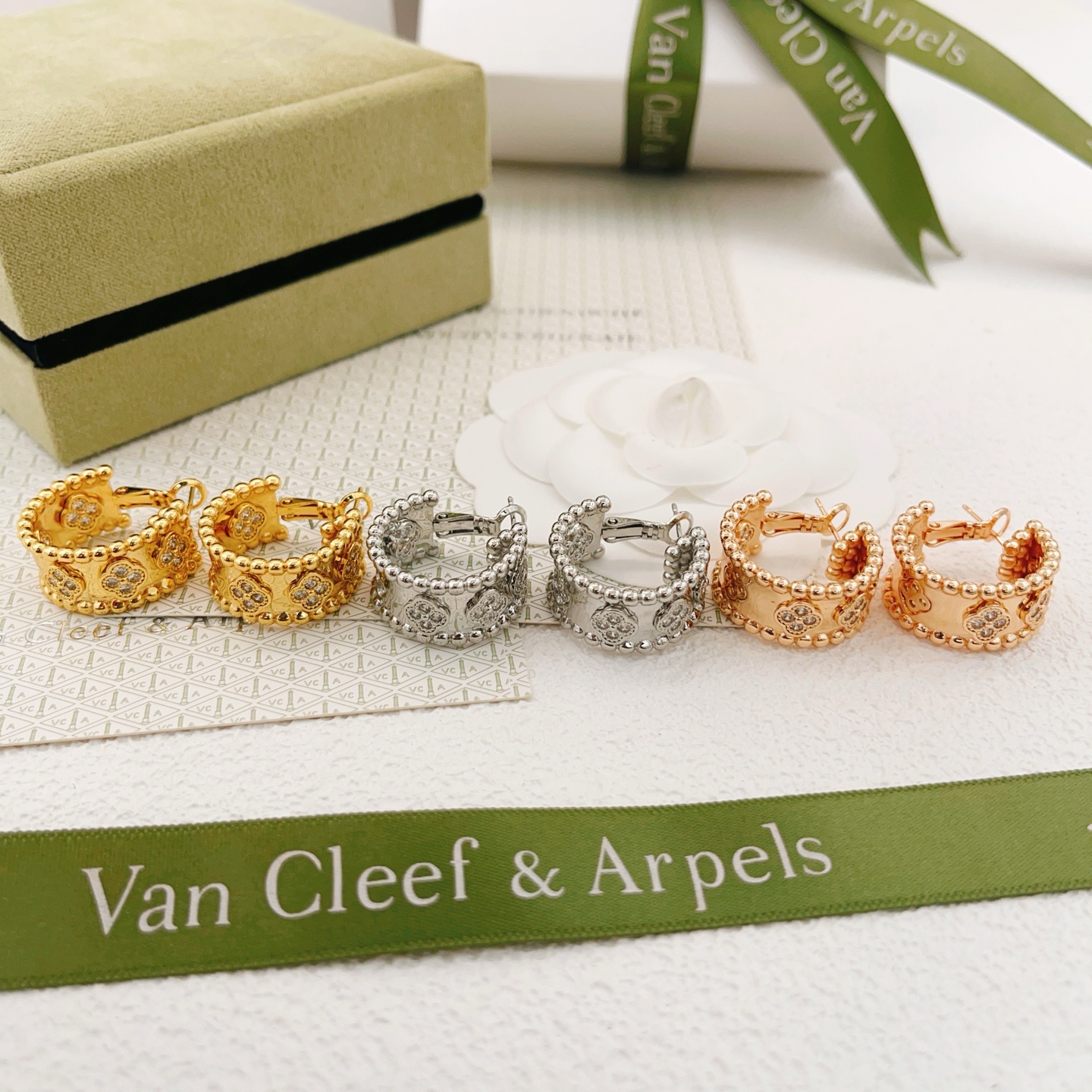 Van Cleef Arpels Perlee Clovers earrings yellow gold with clear diamond accents 12mm hoop diameter