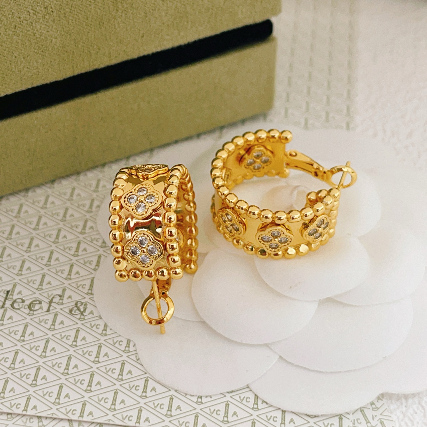 Van Cleef Arpels Perlee Clovers earrings yellow gold with clear diamond accents 12mm hoop diameter