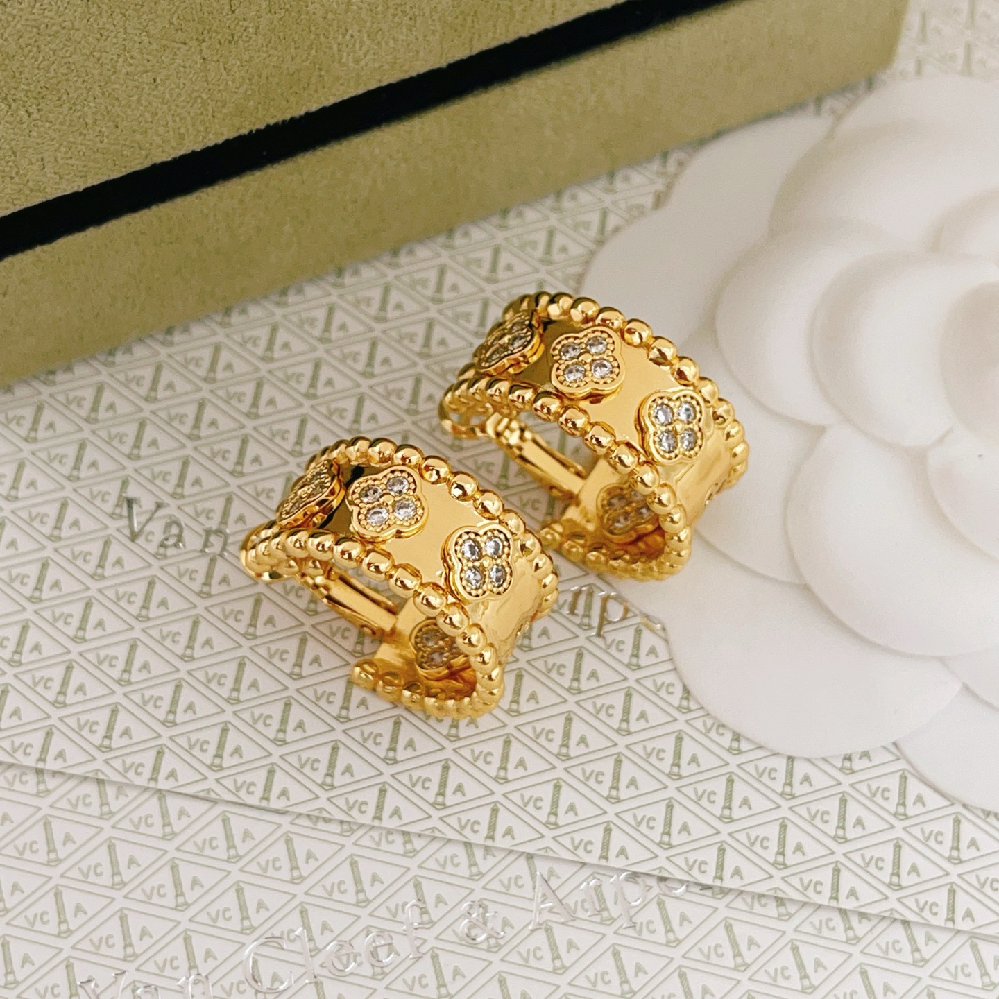 Van Cleef Arpels Perlee Clovers earrings yellow gold with clear diamond accents 12mm hoop diameter