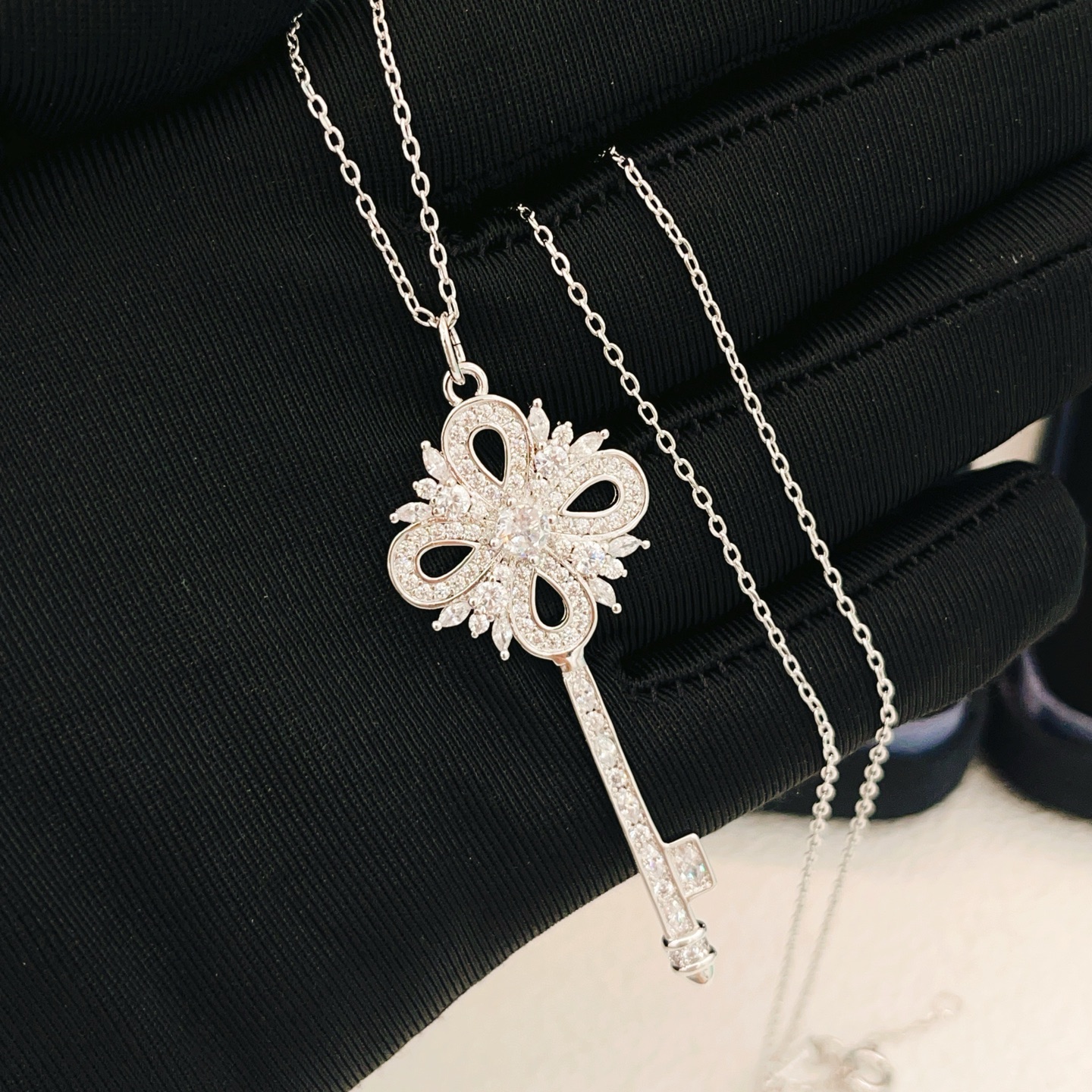 Tiffany Co Tiffany Keys Victoria Key Pendant necklace sterling silver with clear diamond-like gemstones 18 inch adjustable chain